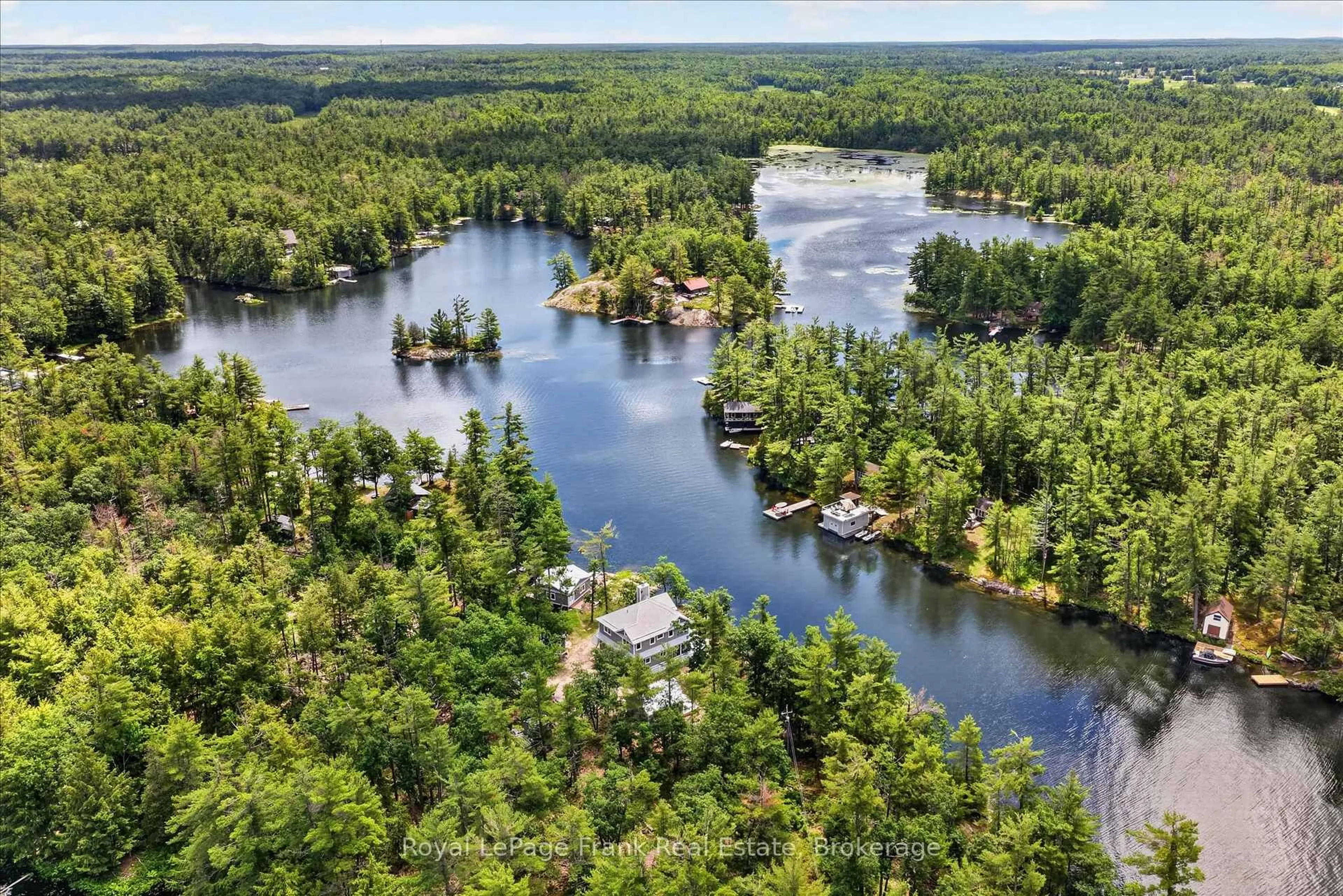 A pic from outside/outdoor area/front of a property/back of a property/a pic from drone, water/lake/river/ocean view for 1012 Island 35 Stoney Lake, Douro-Dummer Ontario K0L 2H0
