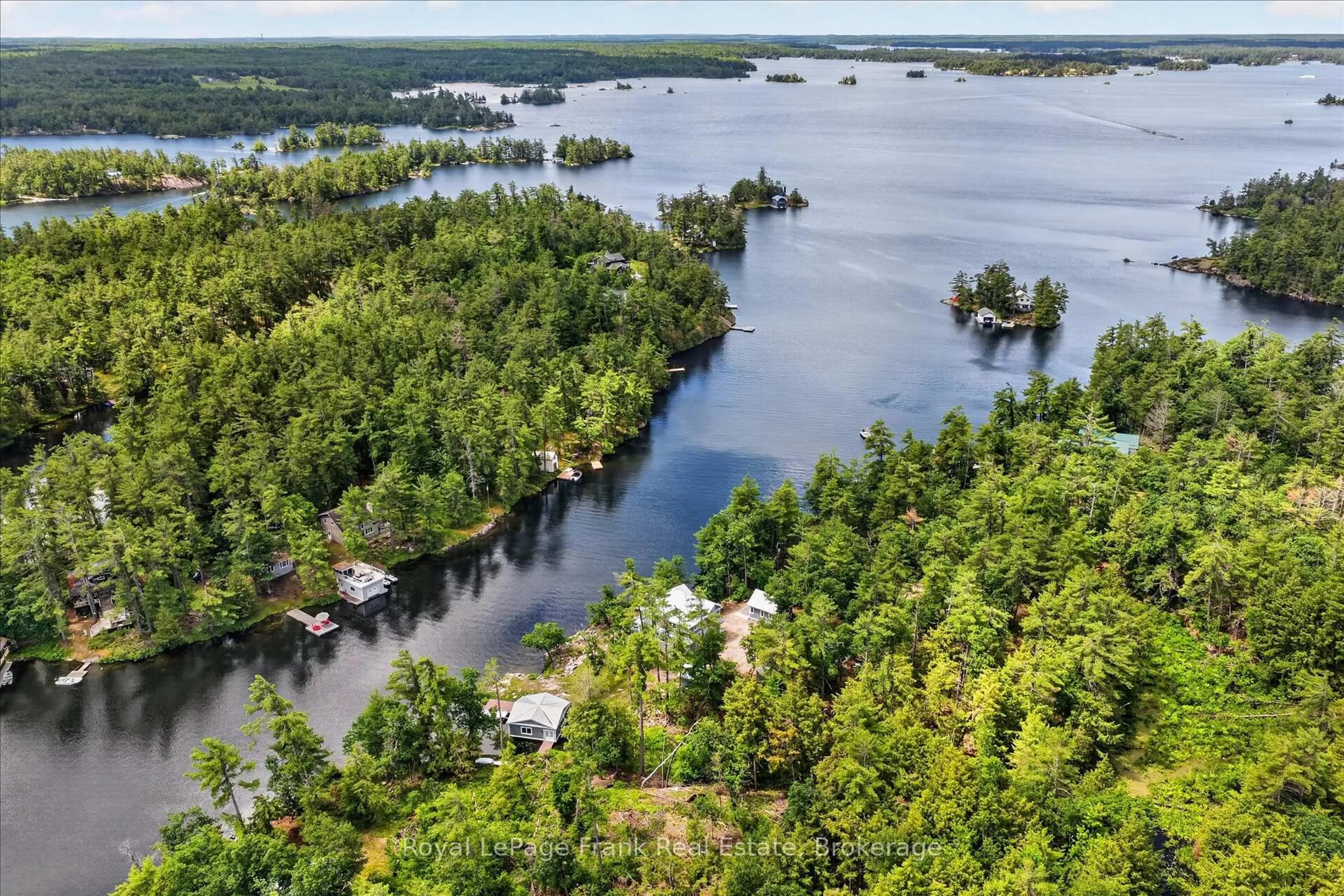 A pic from outside/outdoor area/front of a property/back of a property/a pic from drone, water/lake/river/ocean view for 1012 Island 35 Stoney Lake, Douro-Dummer Ontario K0L 2H0