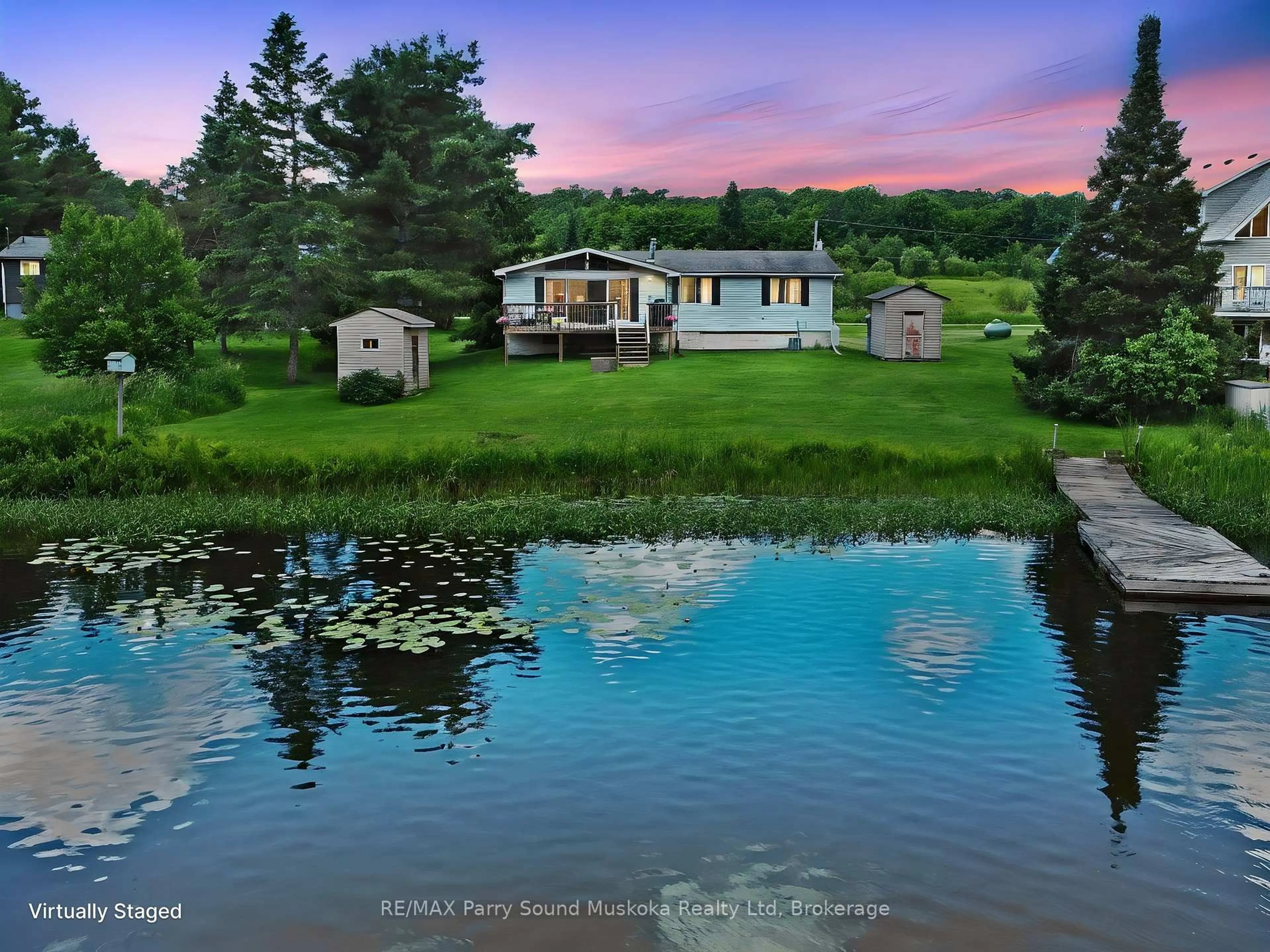 A pic from outside/outdoor area/front of a property/back of a property/a pic from drone, water/lake/river/ocean view for 15 Dockside Dr, McKellar Ontario P0G 1C0