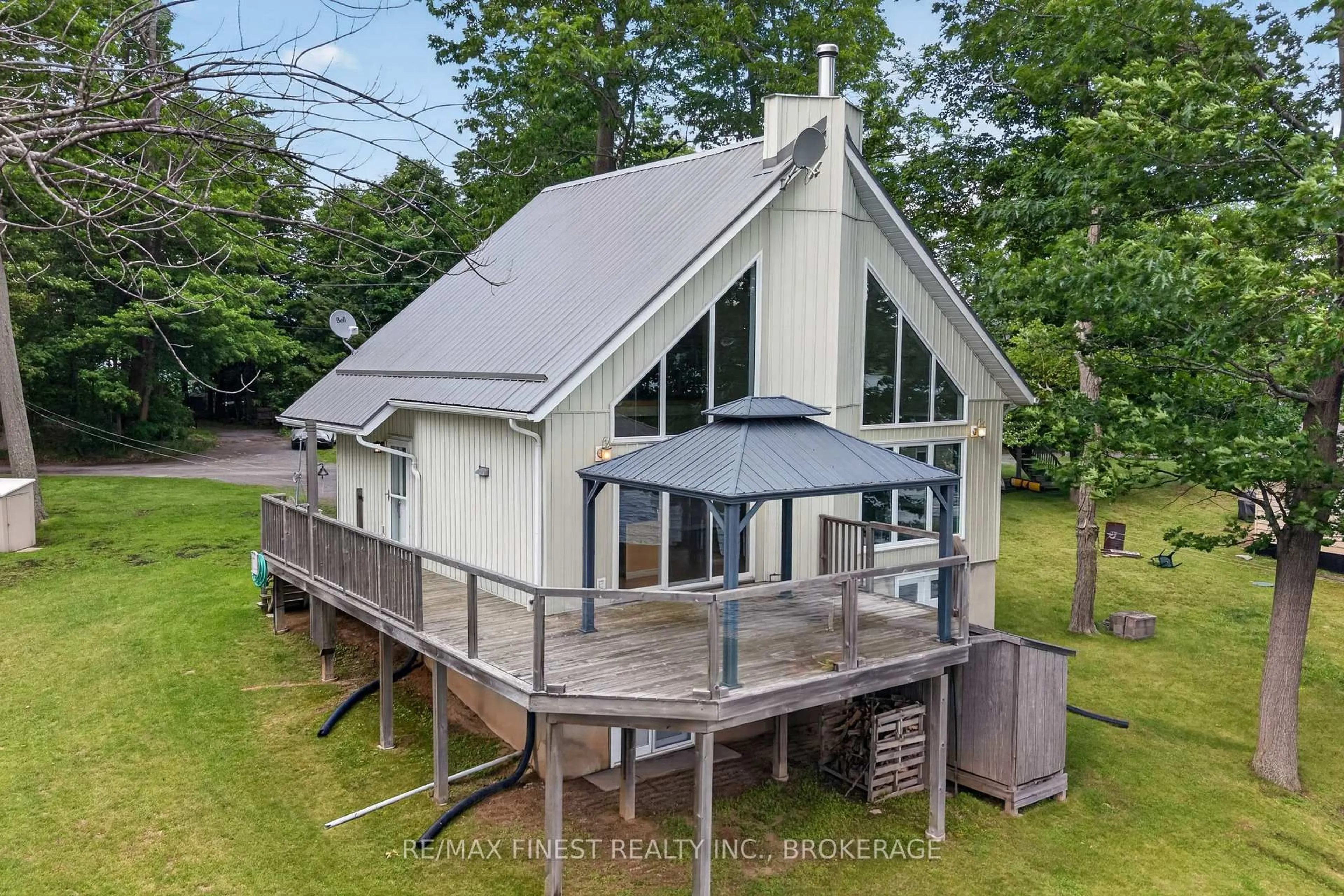 A pic from outside/outdoor area/front of a property/back of a property/a pic from drone, water/lake/river/ocean view for 3459 Buck Point Lane, Inverary Ontario K0H 1X0