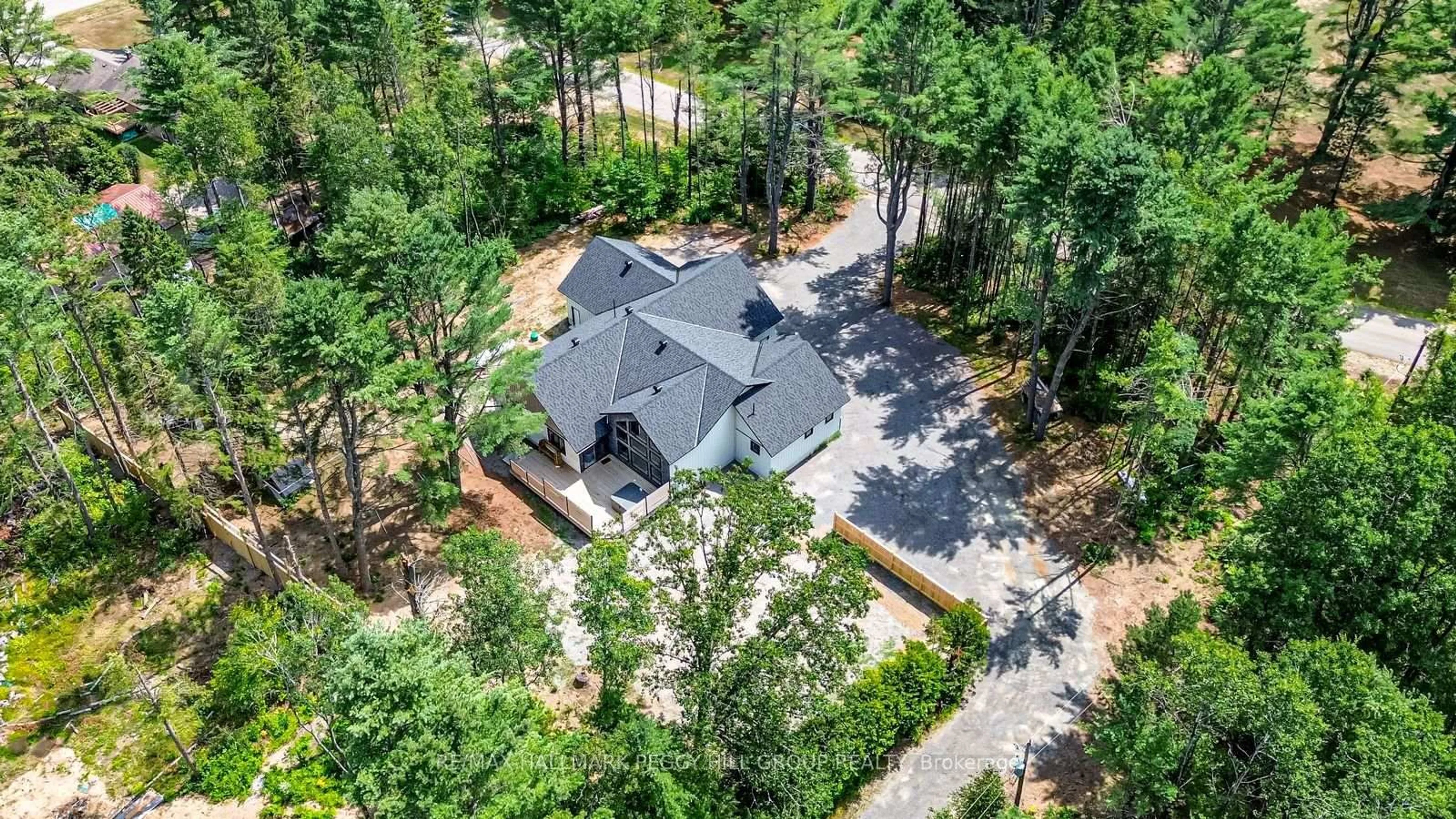 A pic from outside/outdoor area/front of a property/back of a property/a pic from drone, forest/trees view for 24B Buck Hill Rd, Bancroft Ontario K0L 1C0