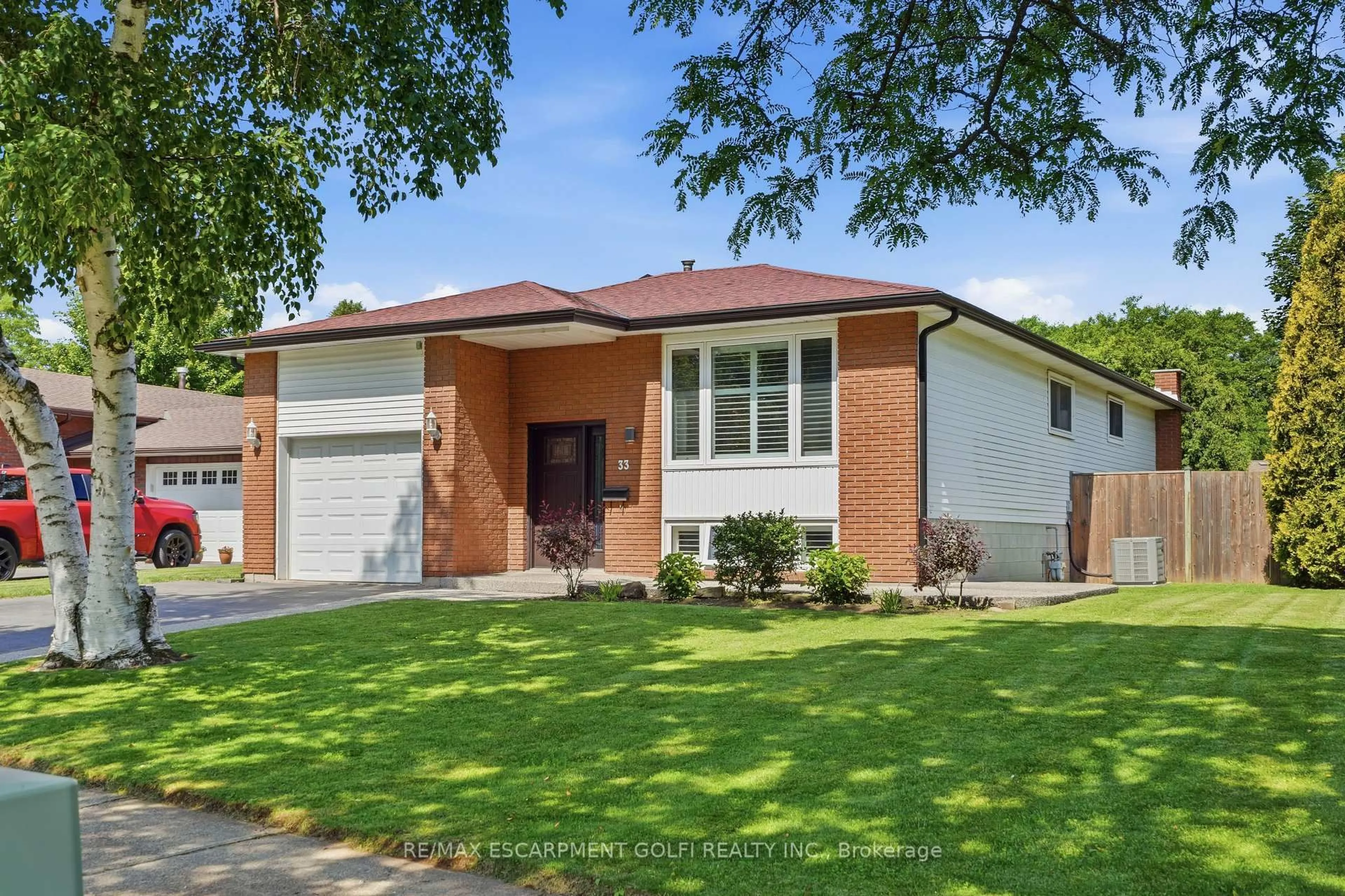 Home with brick exterior material, street for 33 Debora Dr, Grimsby Ontario L3M 4J1