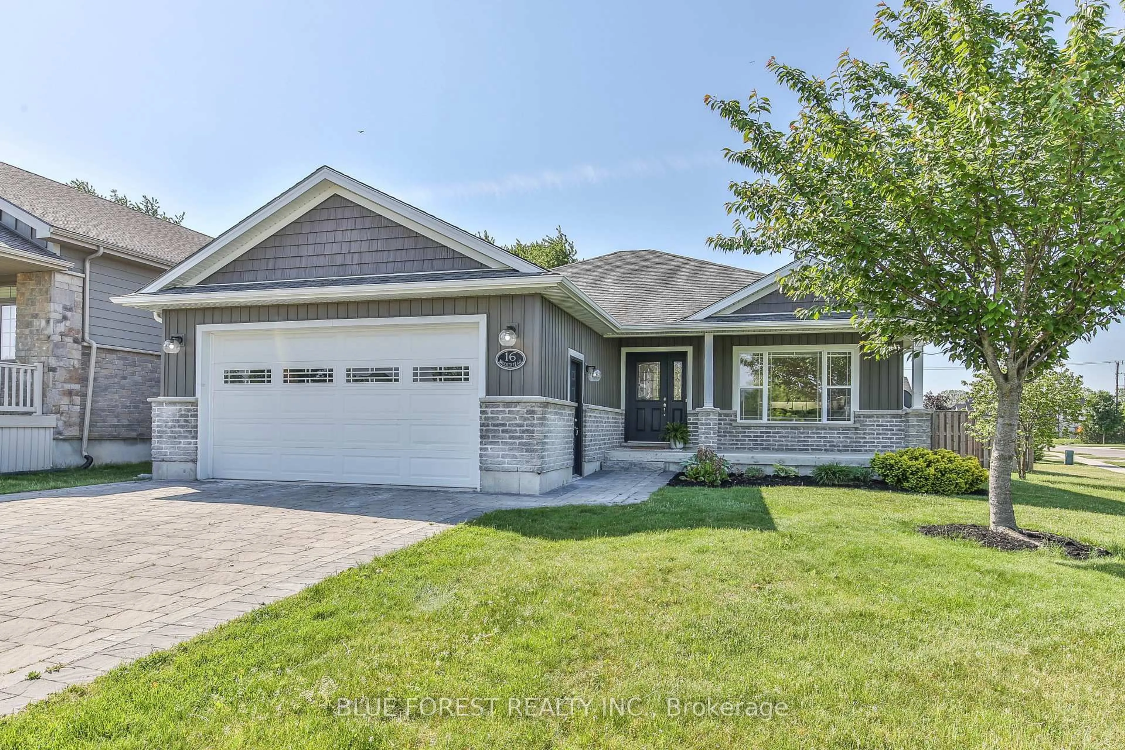 Home with vinyl exterior material, street for 16 Brooker Tr, Thames Centre Ontario N0M 2P0