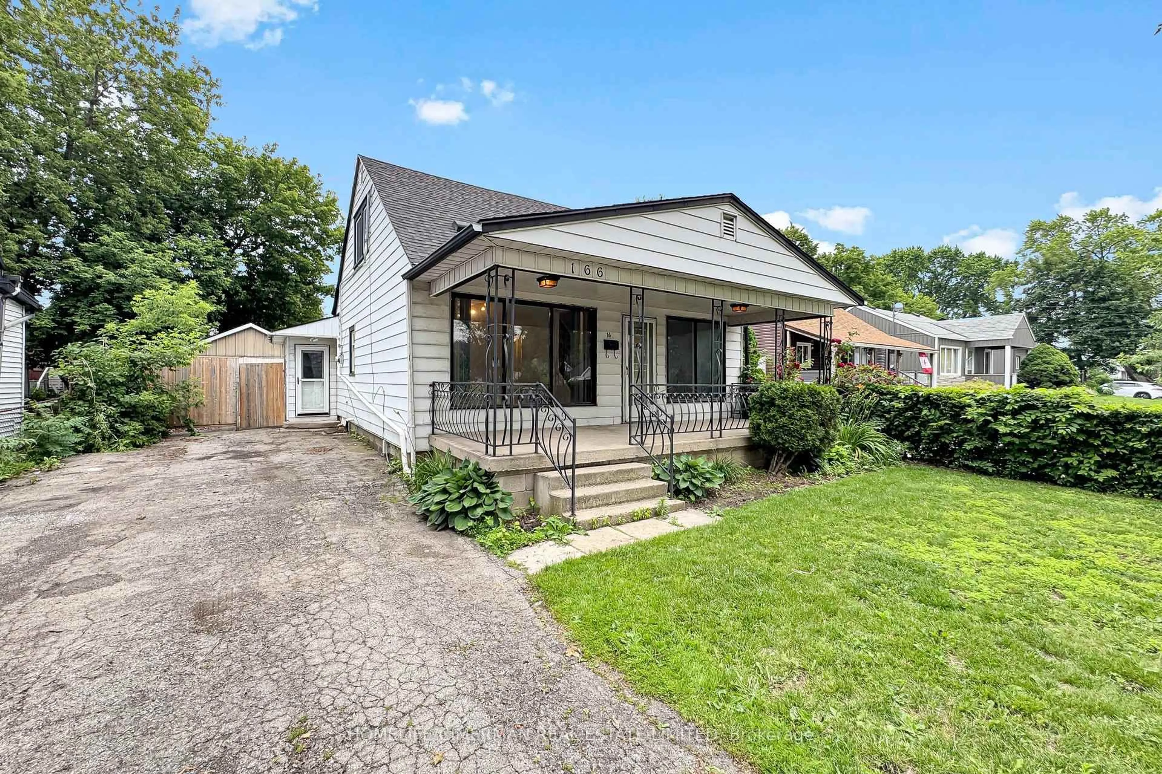 Home with vinyl exterior material, street for 166 Normanhurst Ave, Hamilton Ontario L6H 5M8