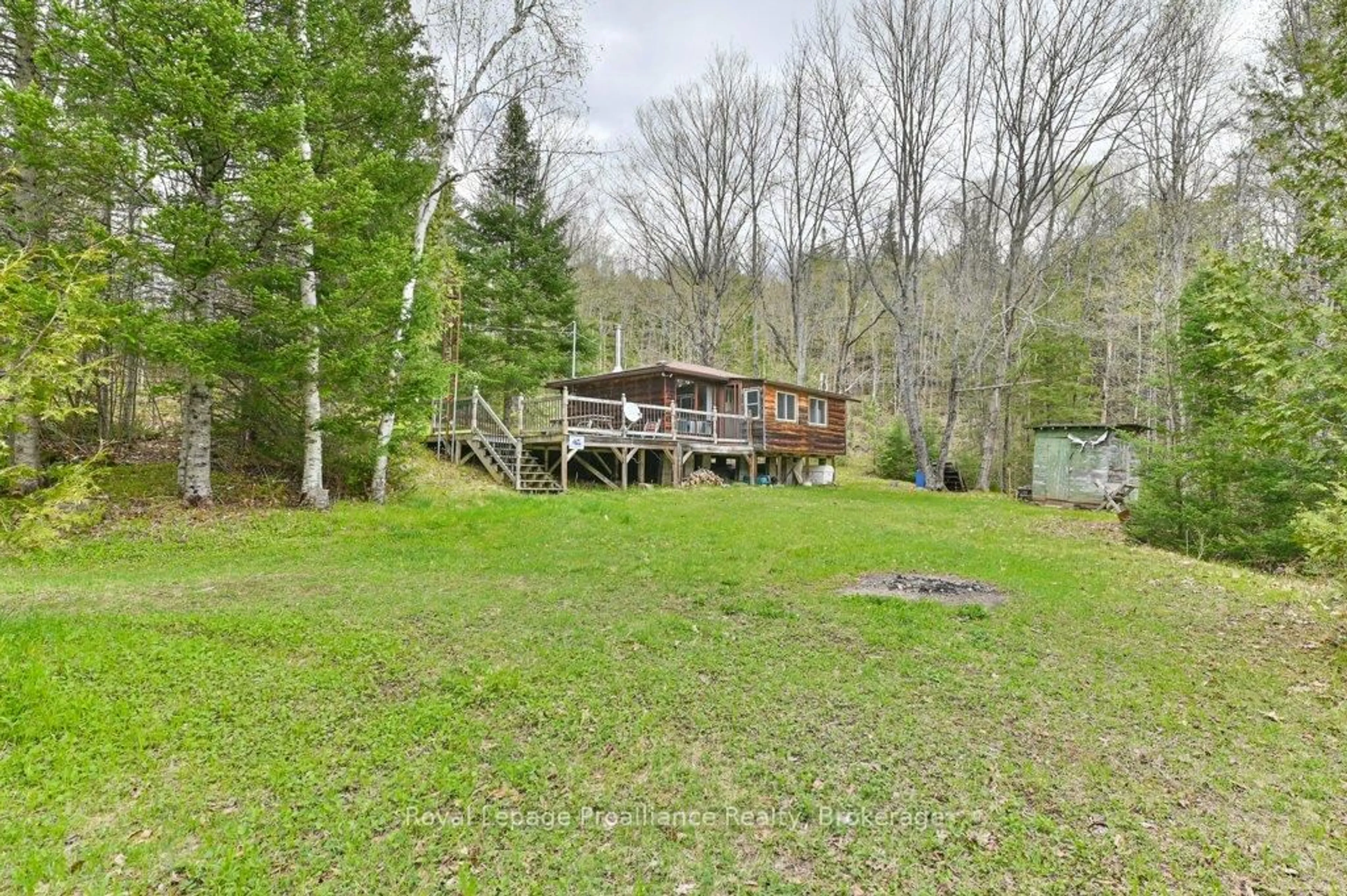 A pic from outside/outdoor area/front of a property/back of a property/a pic from drone, unknown for 2611 River Rd, Ompah Ontario K0H 2J0