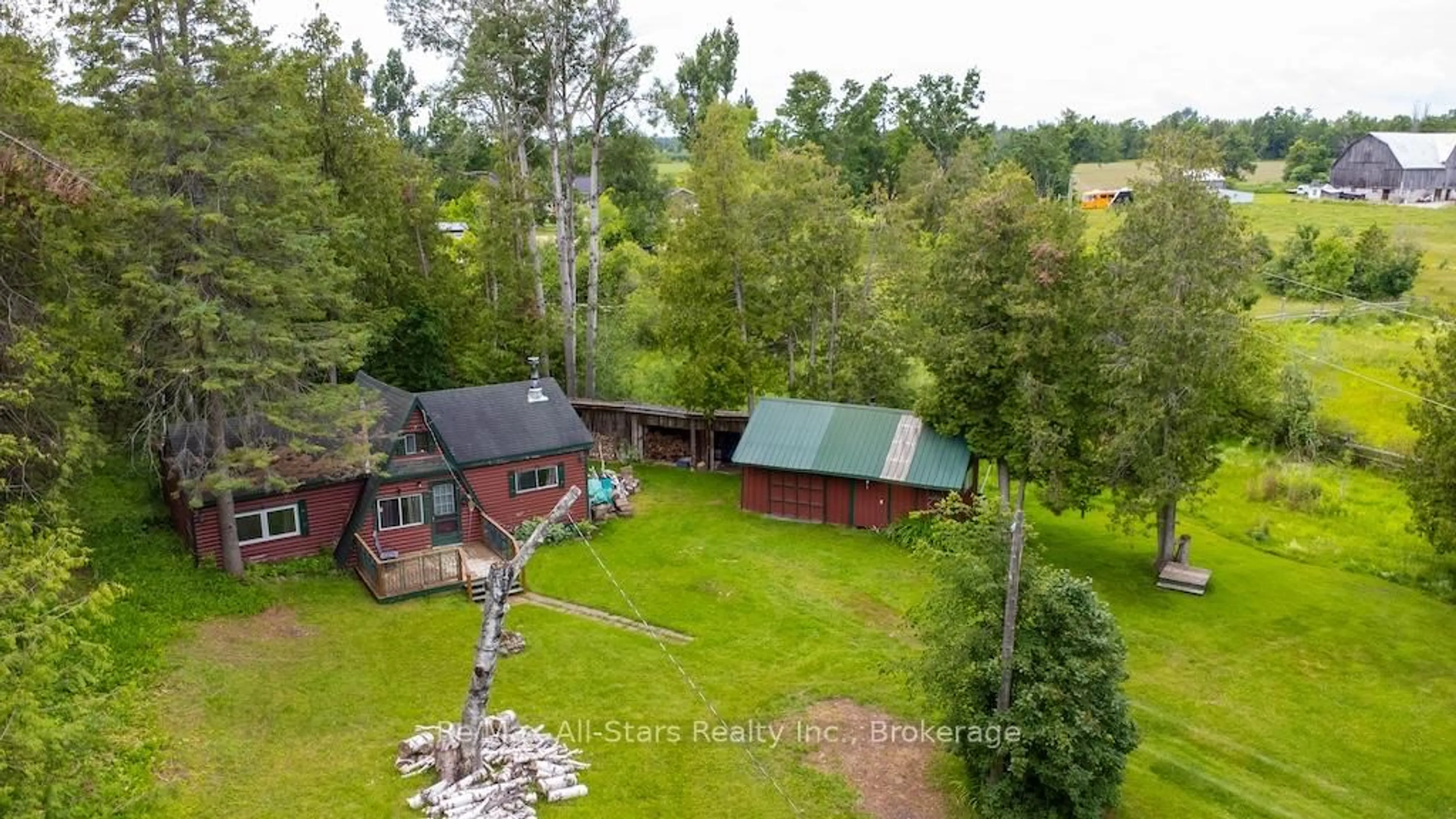 A pic from outside/outdoor area/front of a property/back of a property/a pic from drone, forest/trees view for 111 Wagar Rd, Kawartha Lakes Ontario K0M 1G0
