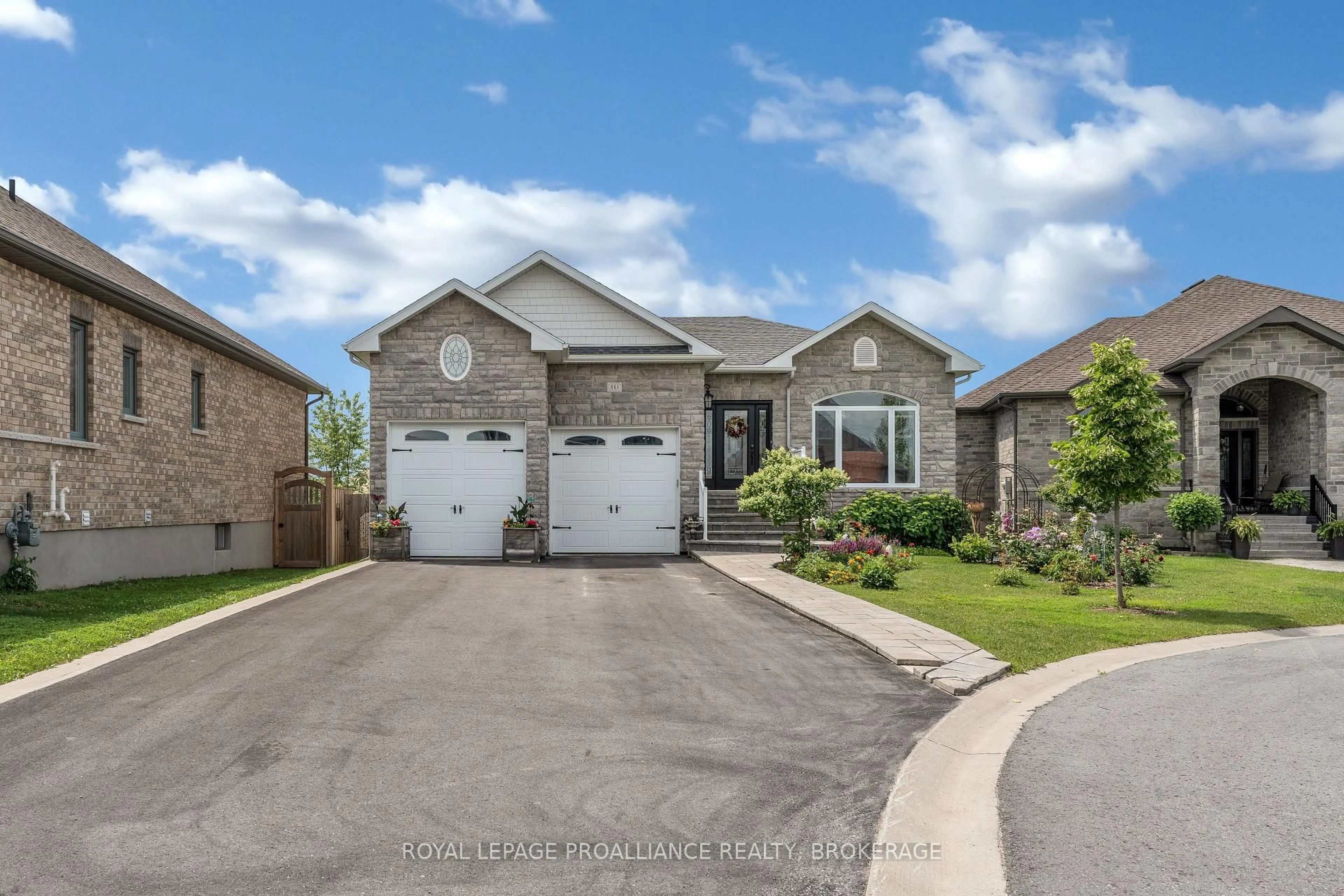 Home with brick exterior material, street for 861 Windermere Dr, Kingston Ontario K7P 0N5