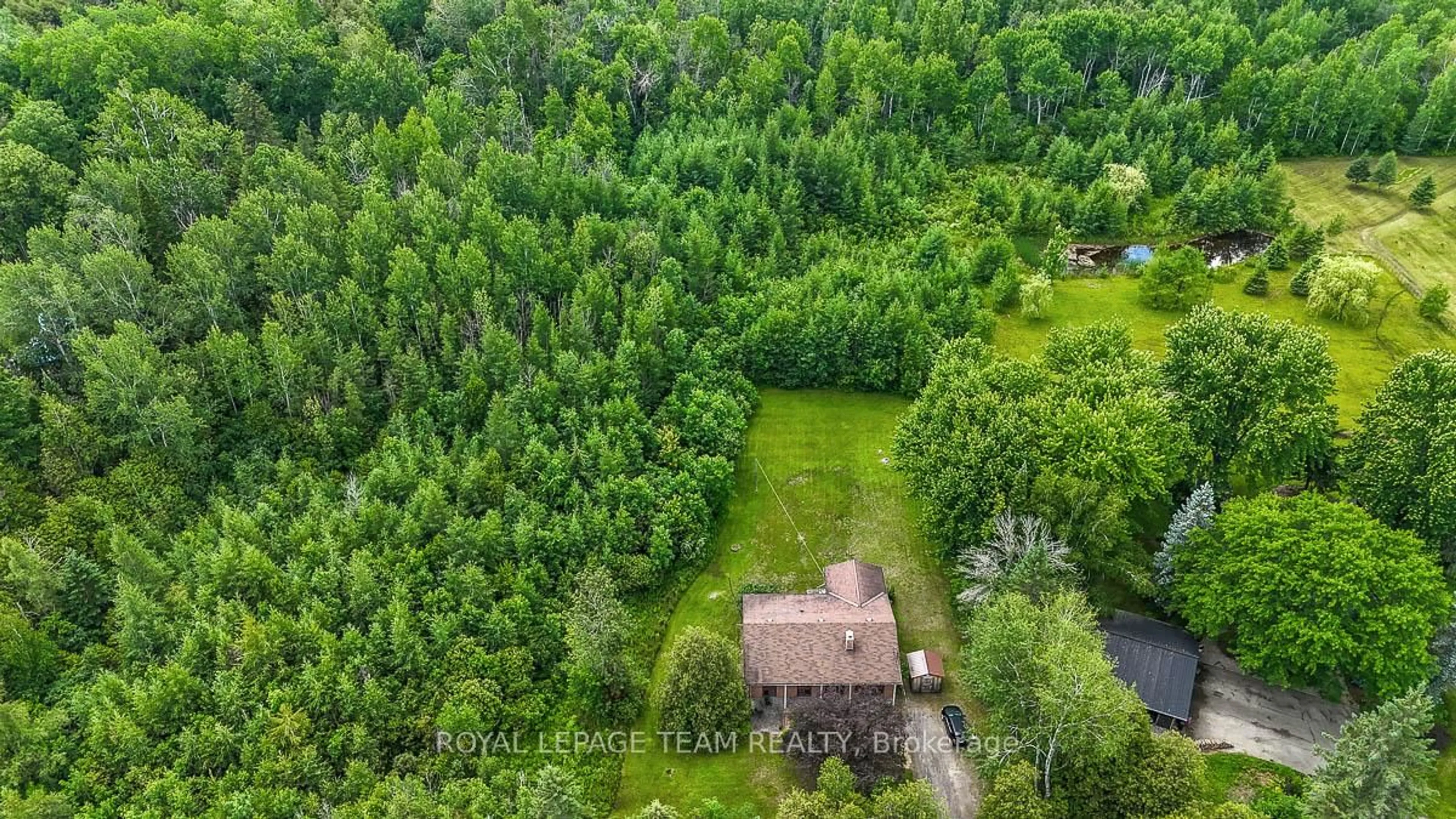 A pic from outside/outdoor area/front of a property/back of a property/a pic from drone, forest/trees view for 324 County rd. 25 Rd, North Grenville Ontario K0G 1S0