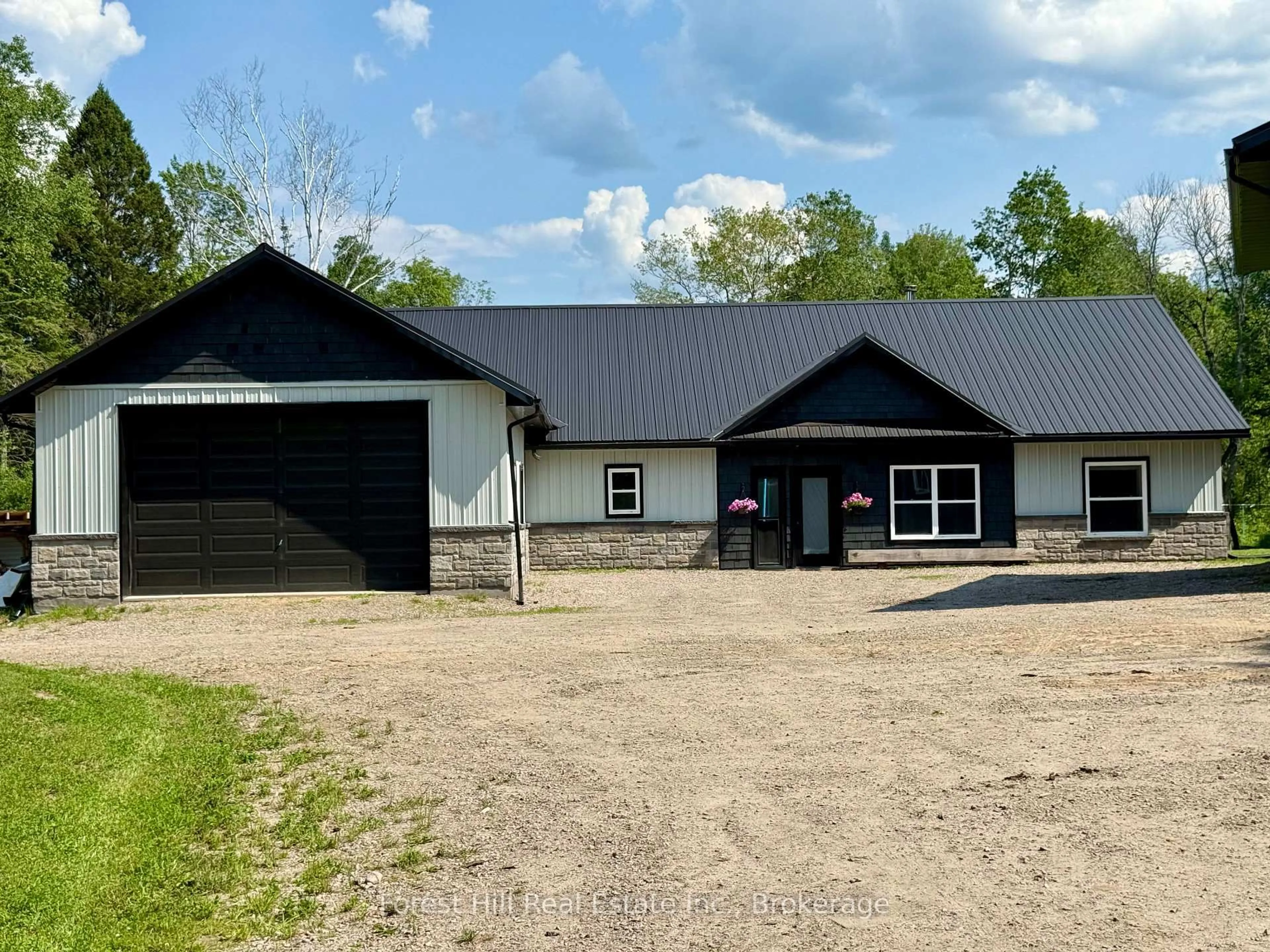 A pic from outside/outdoor area/front of a property/back of a property/a pic from drone, building for 107 Hunt Line, Powassan Ontario P0H 1Z0