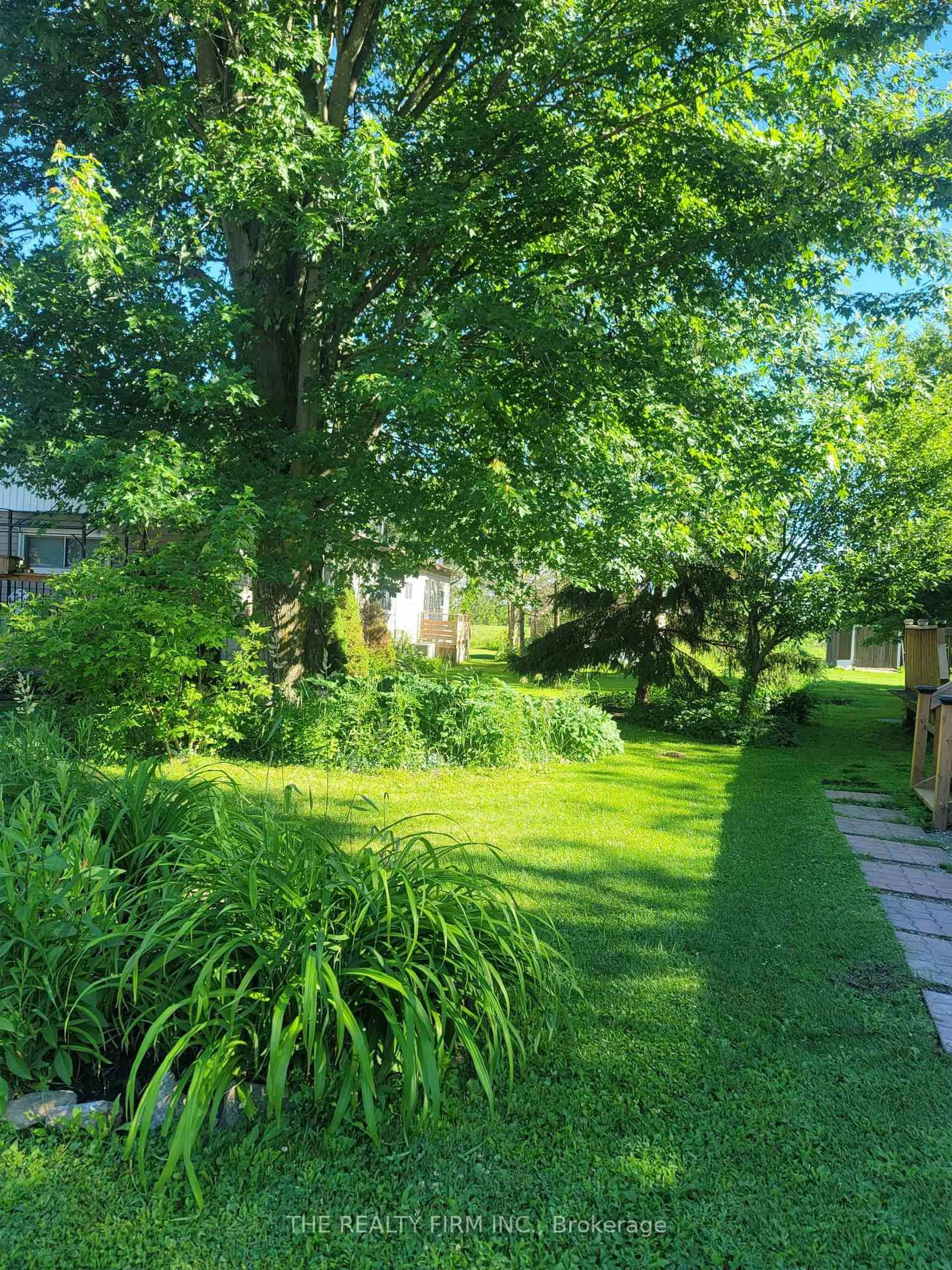 A pic from outside/outdoor area/front of a property/back of a property/a pic from drone, street for 75049 Hensall Rd #18, Huron East Ontario N0K 1W0