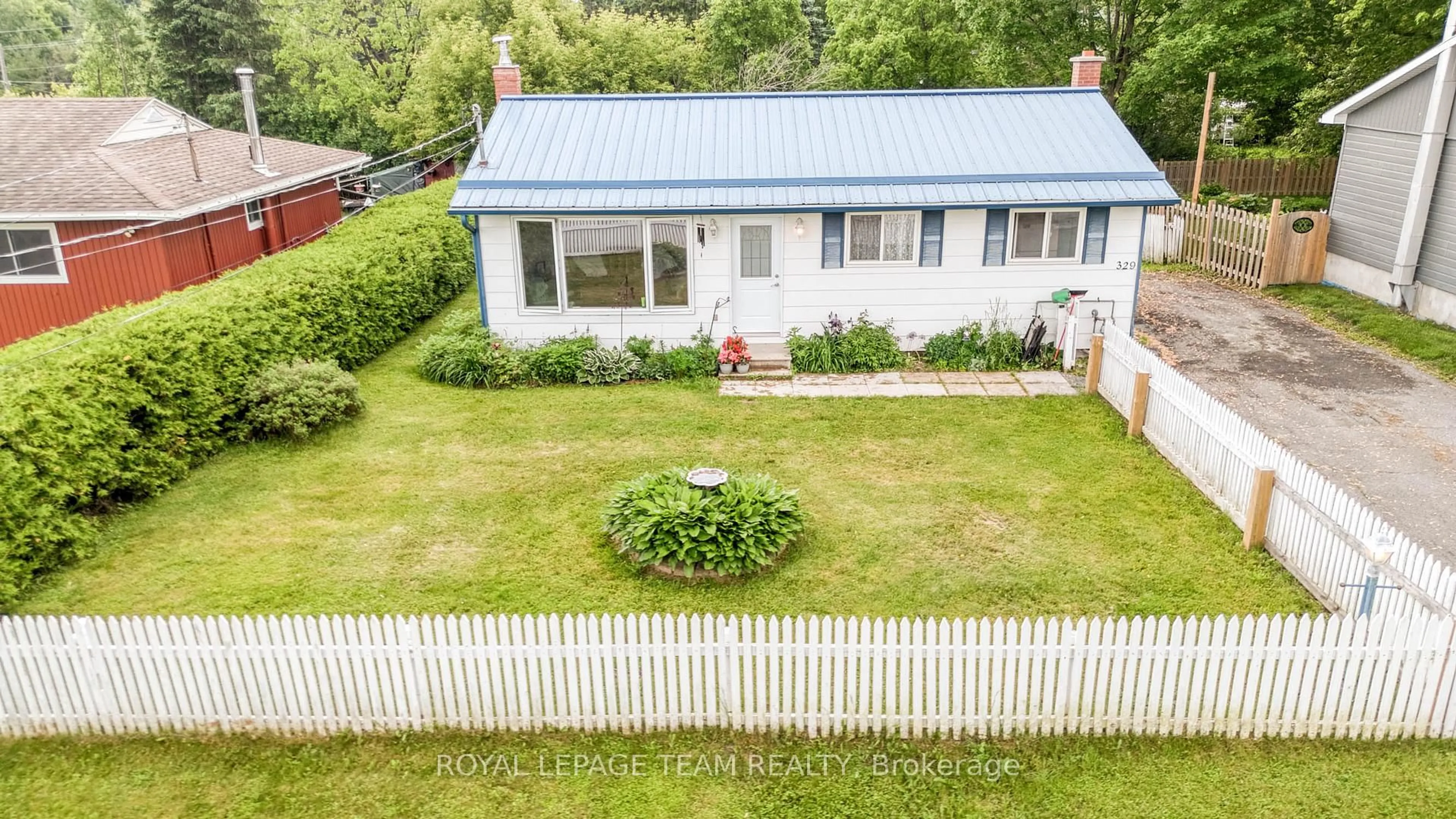 A pic from outside/outdoor area/front of a property/back of a property/a pic from drone, street for 329 Wylie St, Almonte Ontario K0A 1A0