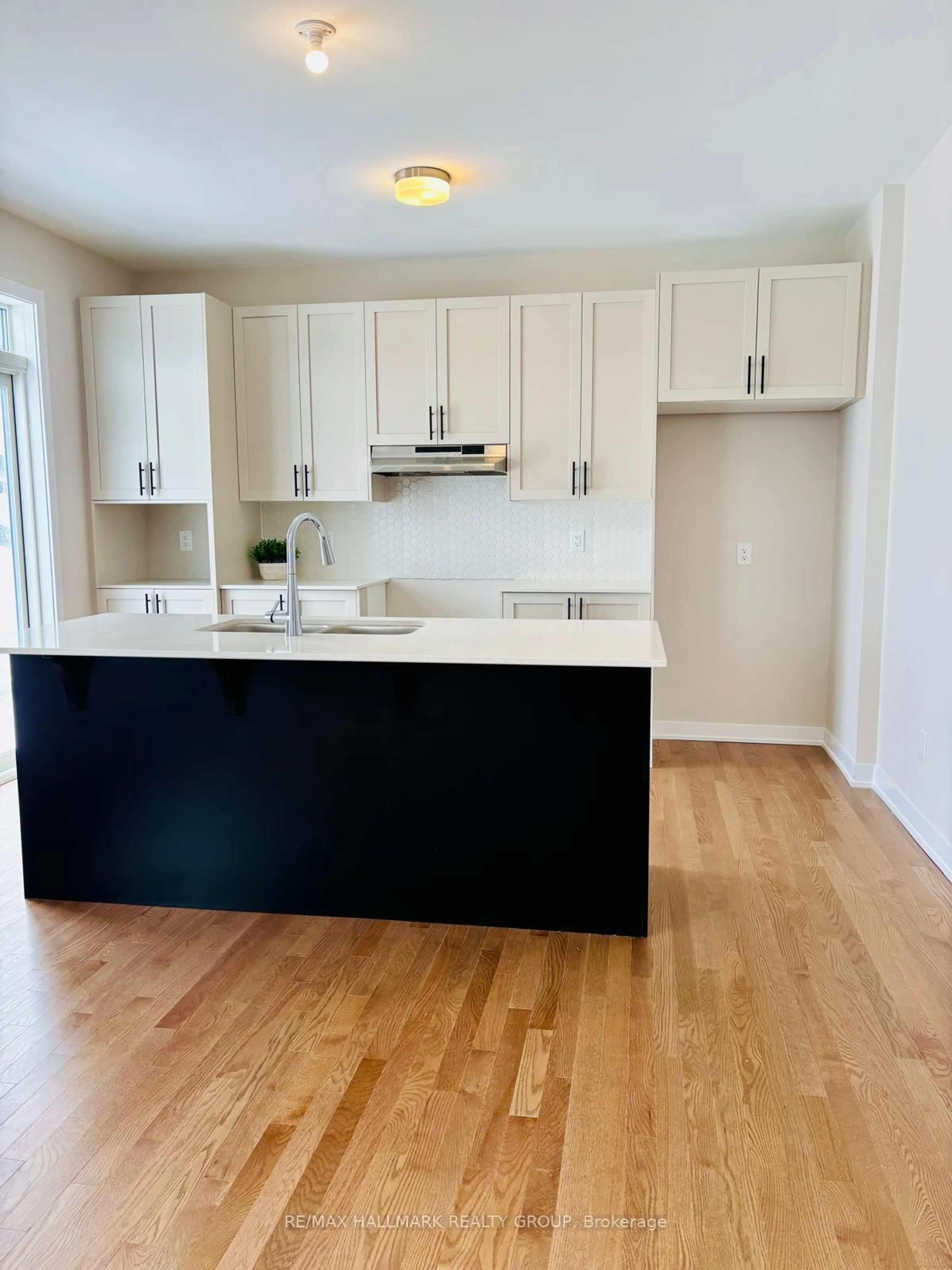Open concept kitchen, wood/laminate floor for 170 Conservancy Dr, Nepean Ontario K2J 7L8