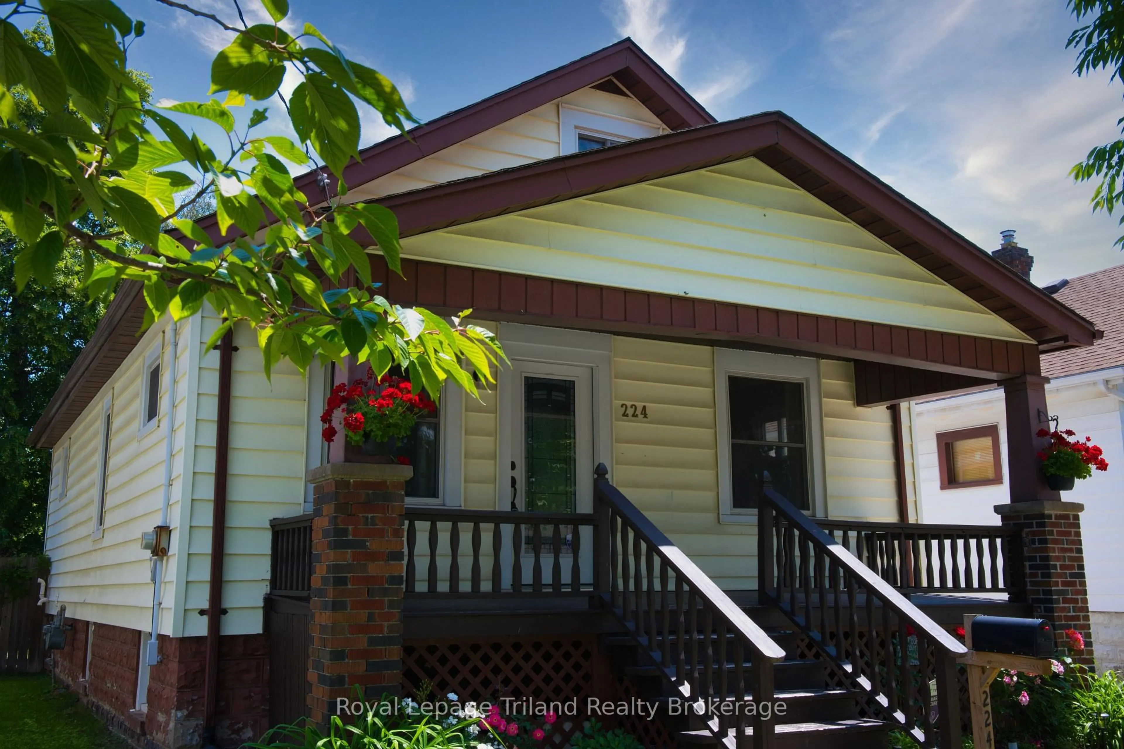 Home with vinyl exterior material, street for 224 Harkness St, Sarnia Ontario N7T 3H4
