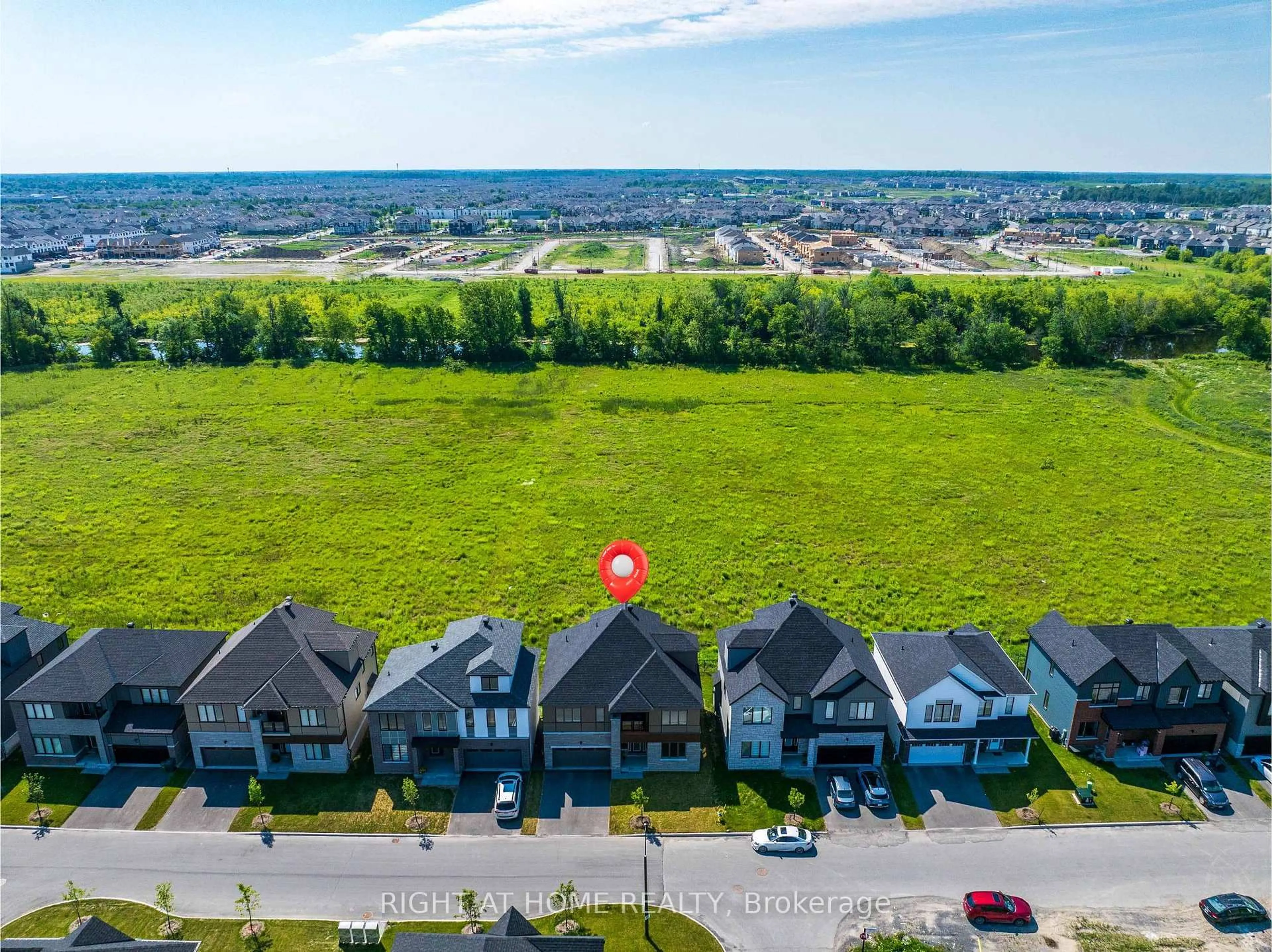 A pic from outside/outdoor area/front of a property/back of a property/a pic from drone, water/lake/river/ocean view for 517 Elation Hts, Ottawa Ontario K2J 4J4