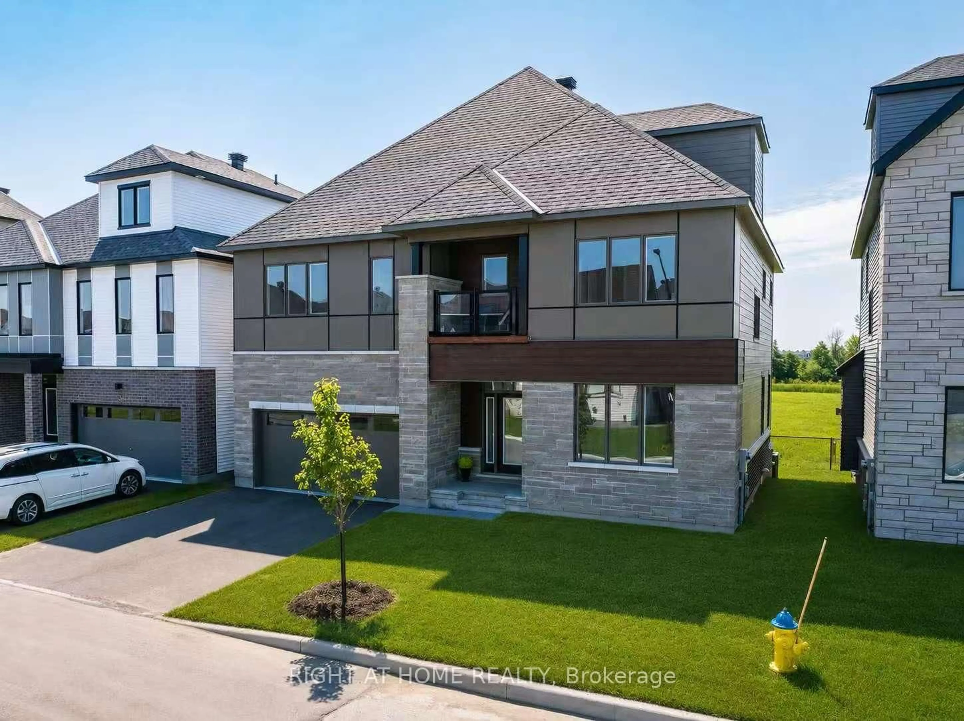 Home with brick exterior material, street for 517 Elation Hts, Ottawa Ontario K2J 4J4