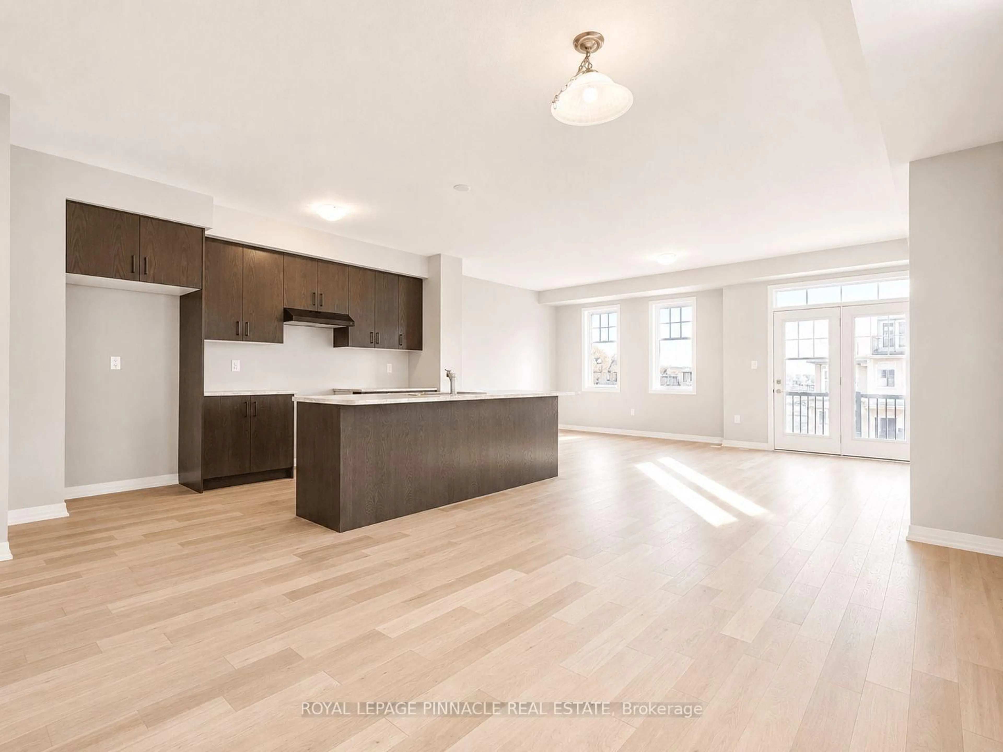 Open concept kitchen, wood/laminate floor for 52 Norwich Cres, Haldimand Ontario N3W 0J4