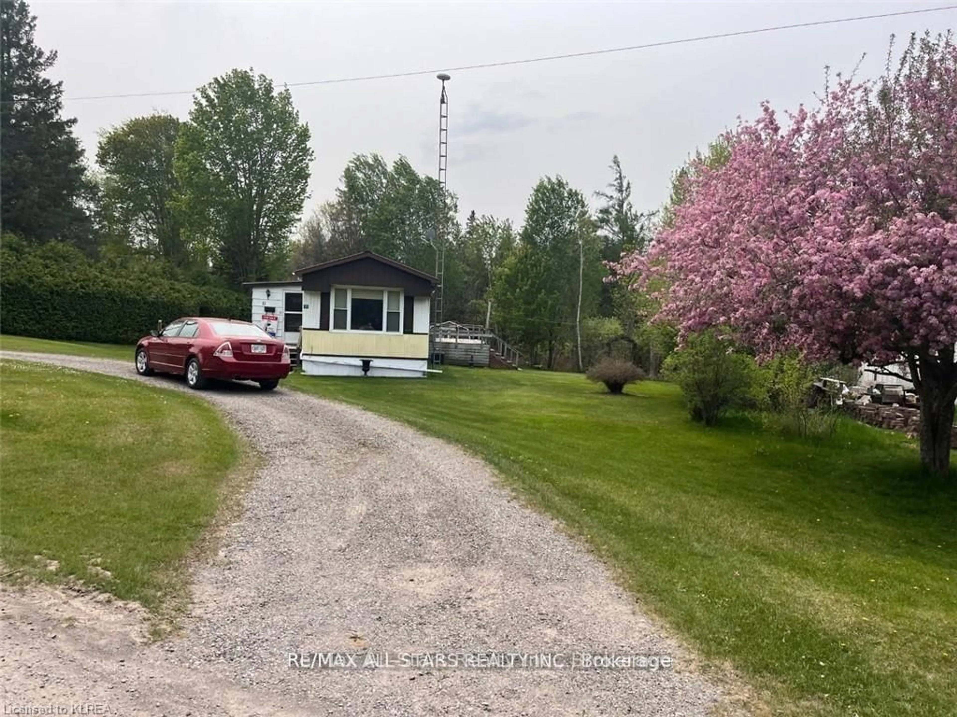 A pic from outside/outdoor area/front of a property/back of a property/a pic from drone, street for 11 Beverly Rd, Kawartha Lakes Ontario L0B 1K0