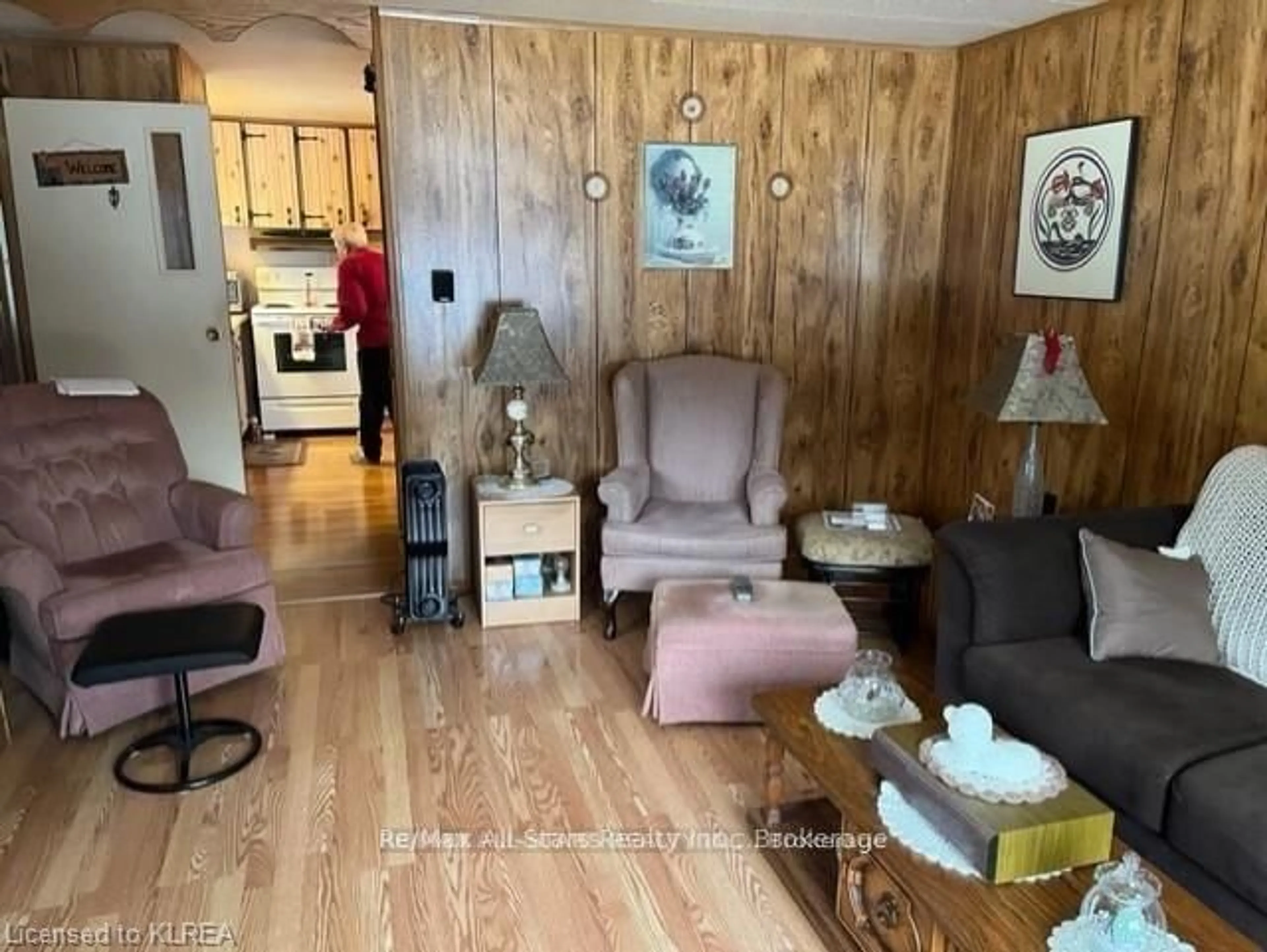 Living room with furniture, wood/laminate floor for 11 Beverly Rd, Kawartha Lakes Ontario L0B 1K0