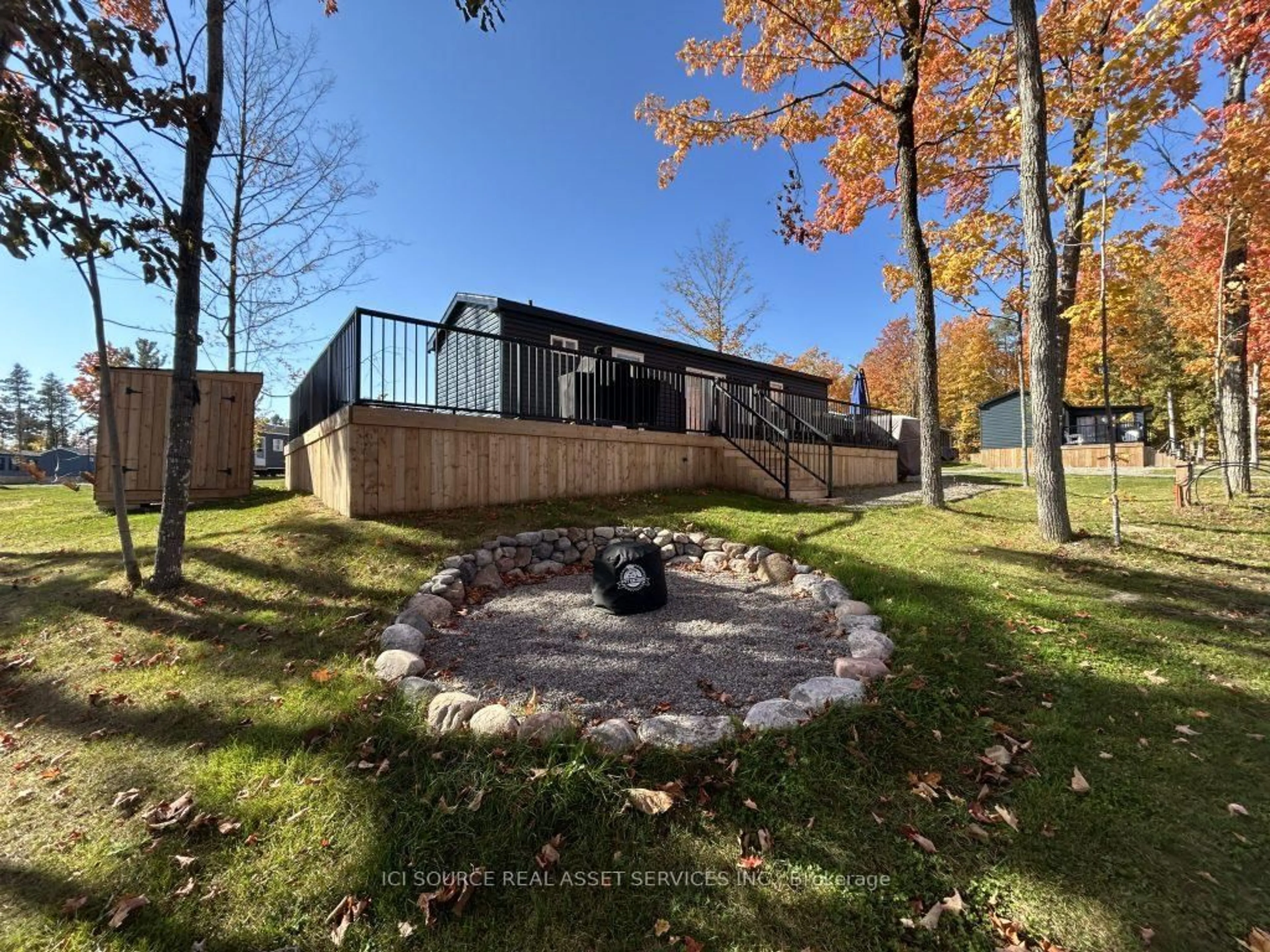 A pic from outside/outdoor area/front of a property/back of a property/a pic from drone, unknown for 1235 Villiers Line #CHL027, Otonabee-South Monaghan Ontario K0L 2G0