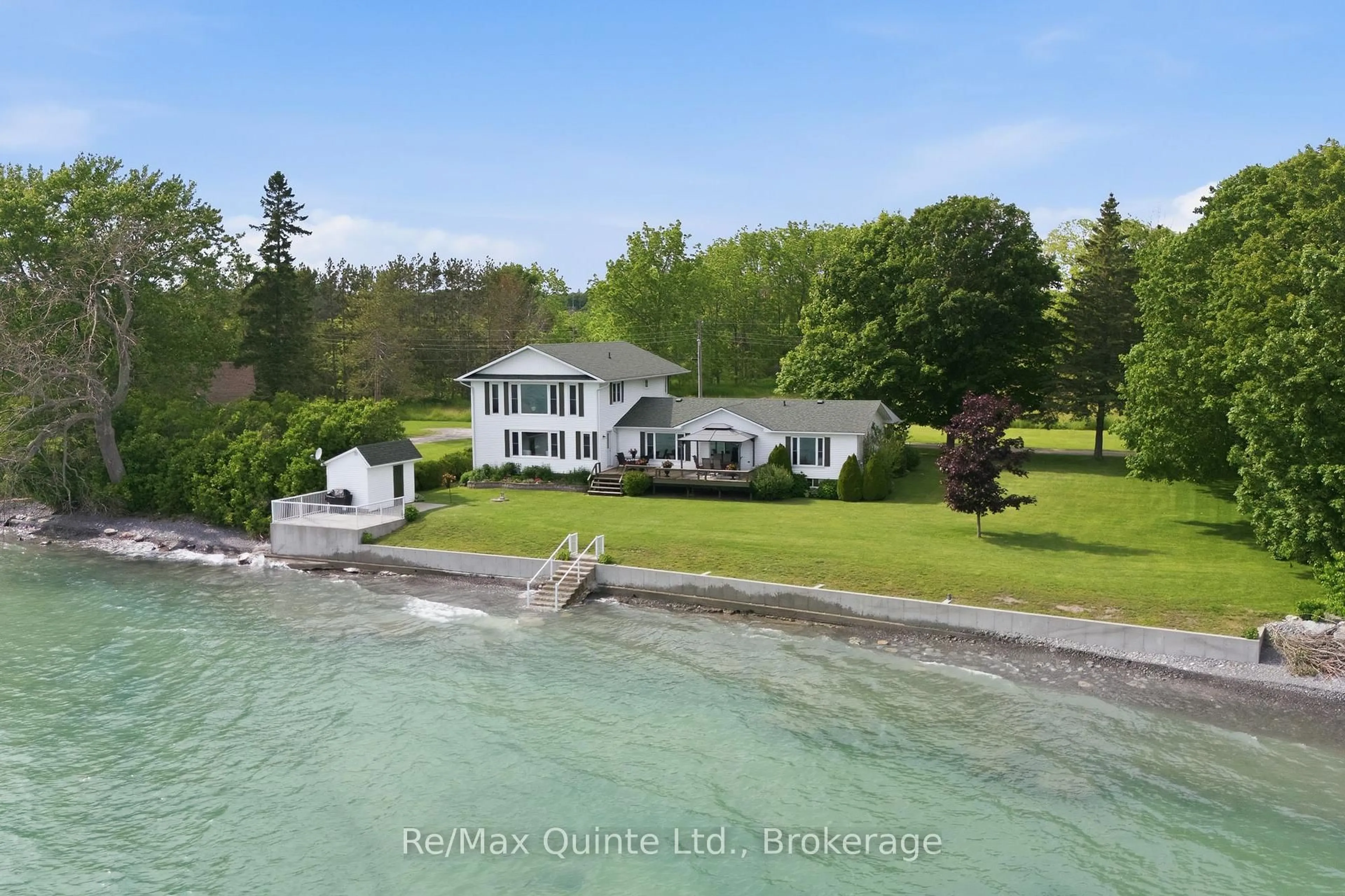 A pic from outside/outdoor area/front of a property/back of a property/a pic from drone, water/lake/river/ocean view for 29 Hyatt Lane, Prince Edward County Ontario K0K 2T0
