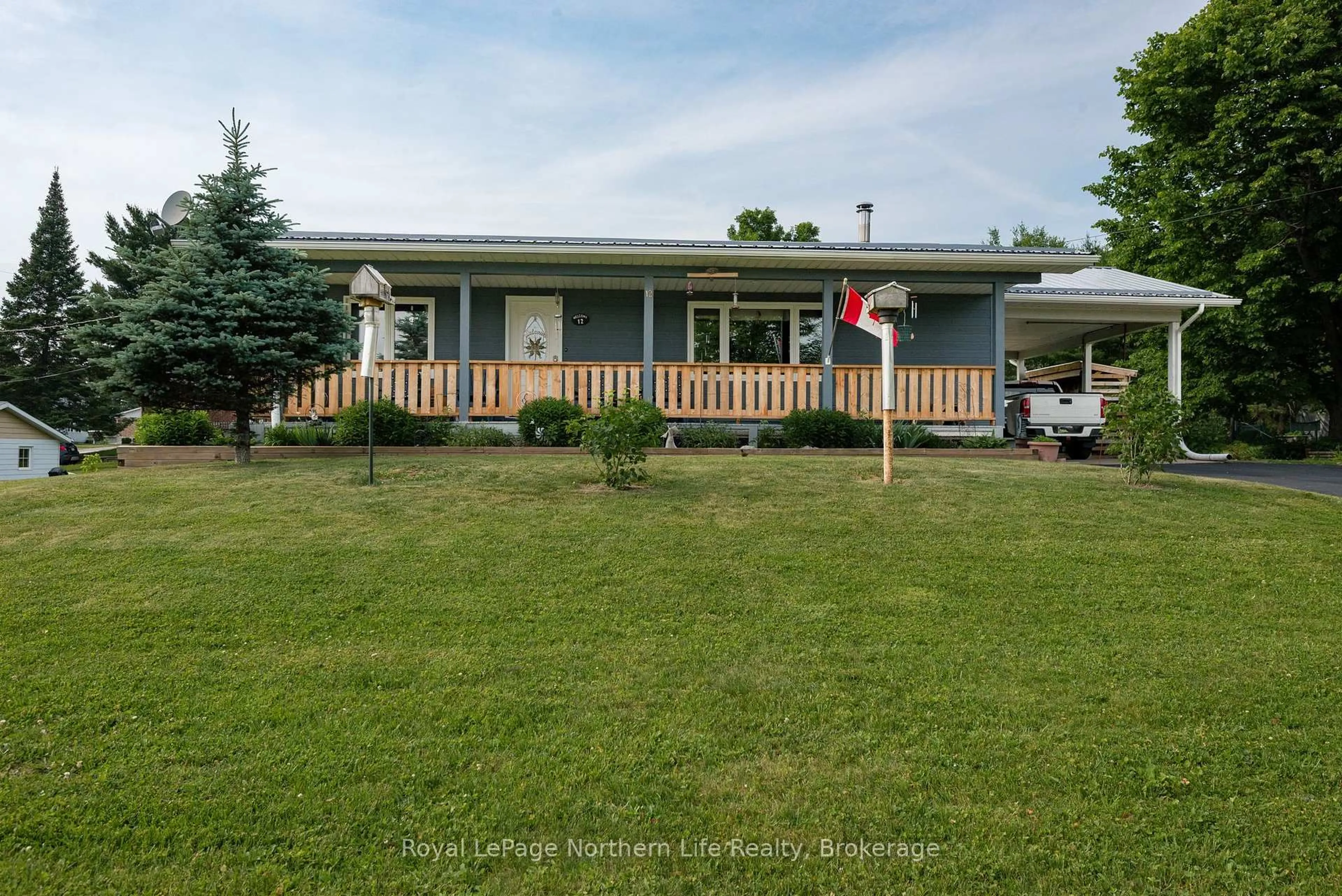 A pic from outside/outdoor area/front of a property/back of a property/a pic from drone, unknown for 12 Valley View Dr, Powassan Ontario P0H 1Z0
