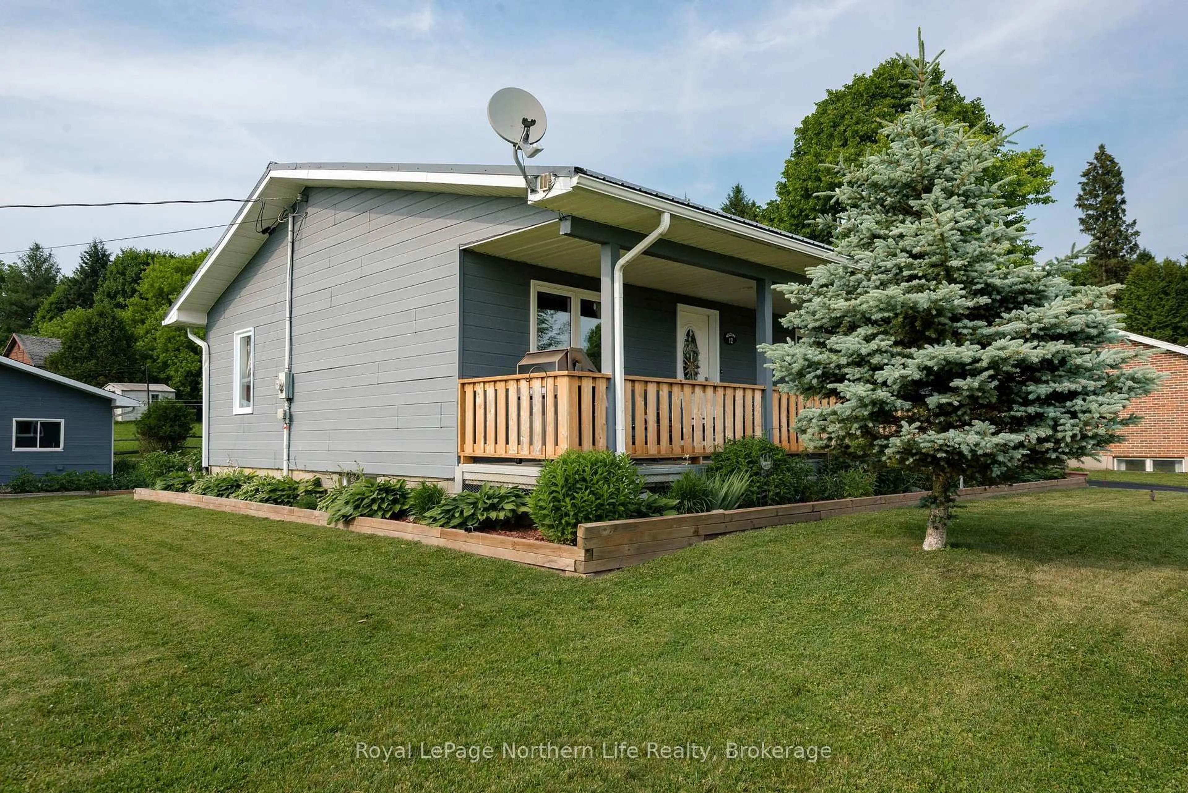 Home with vinyl exterior material, street for 12 Valley View Dr, Powassan Ontario P0H 1Z0