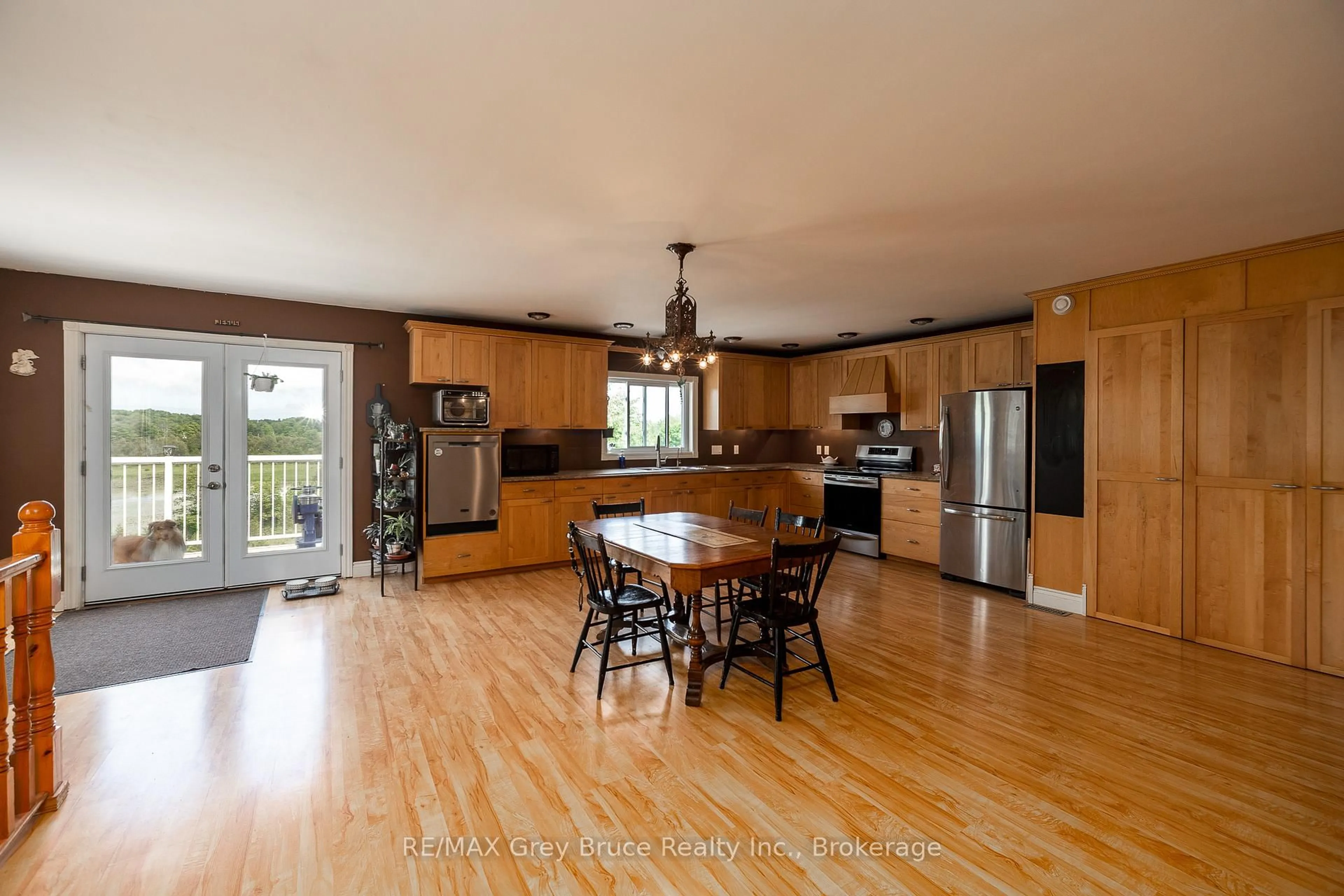 Open concept kitchen, wood/laminate floor for 114 Victoria St, Chatsworth Ontario N0H 2S0