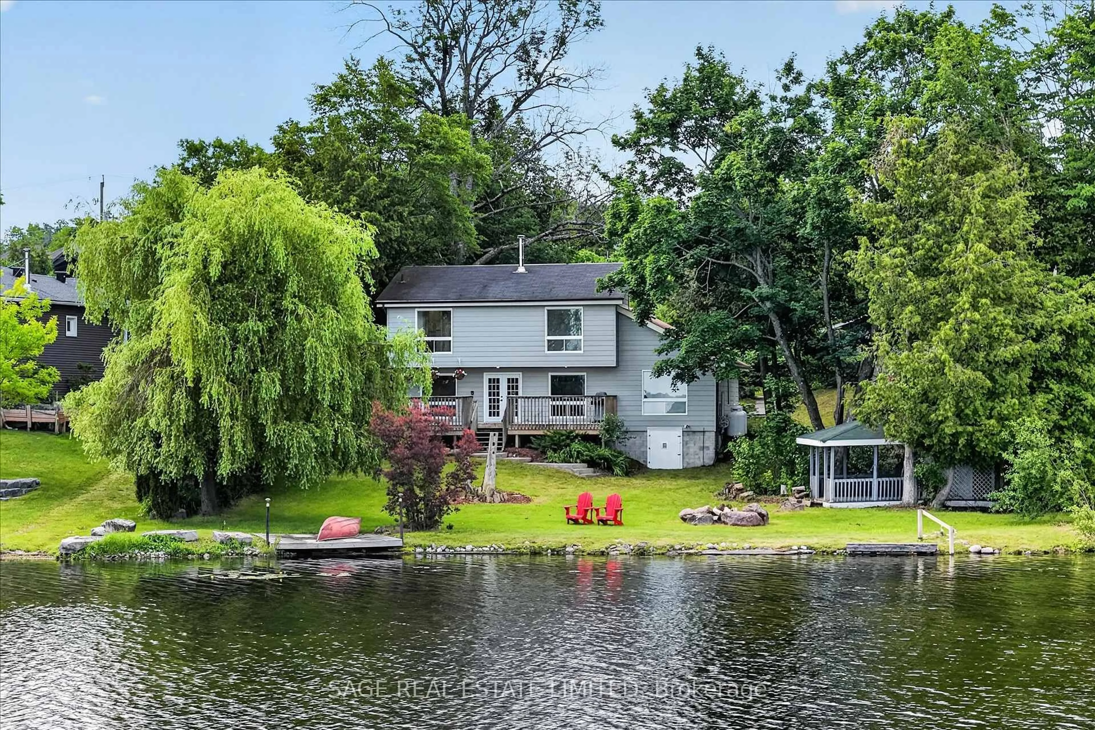 A pic from outside/outdoor area/front of a property/back of a property/a pic from drone, water/lake/river/ocean view for 1756 Gordon Fitzgerald Lane, Selwyn Ontario K0L 2H0