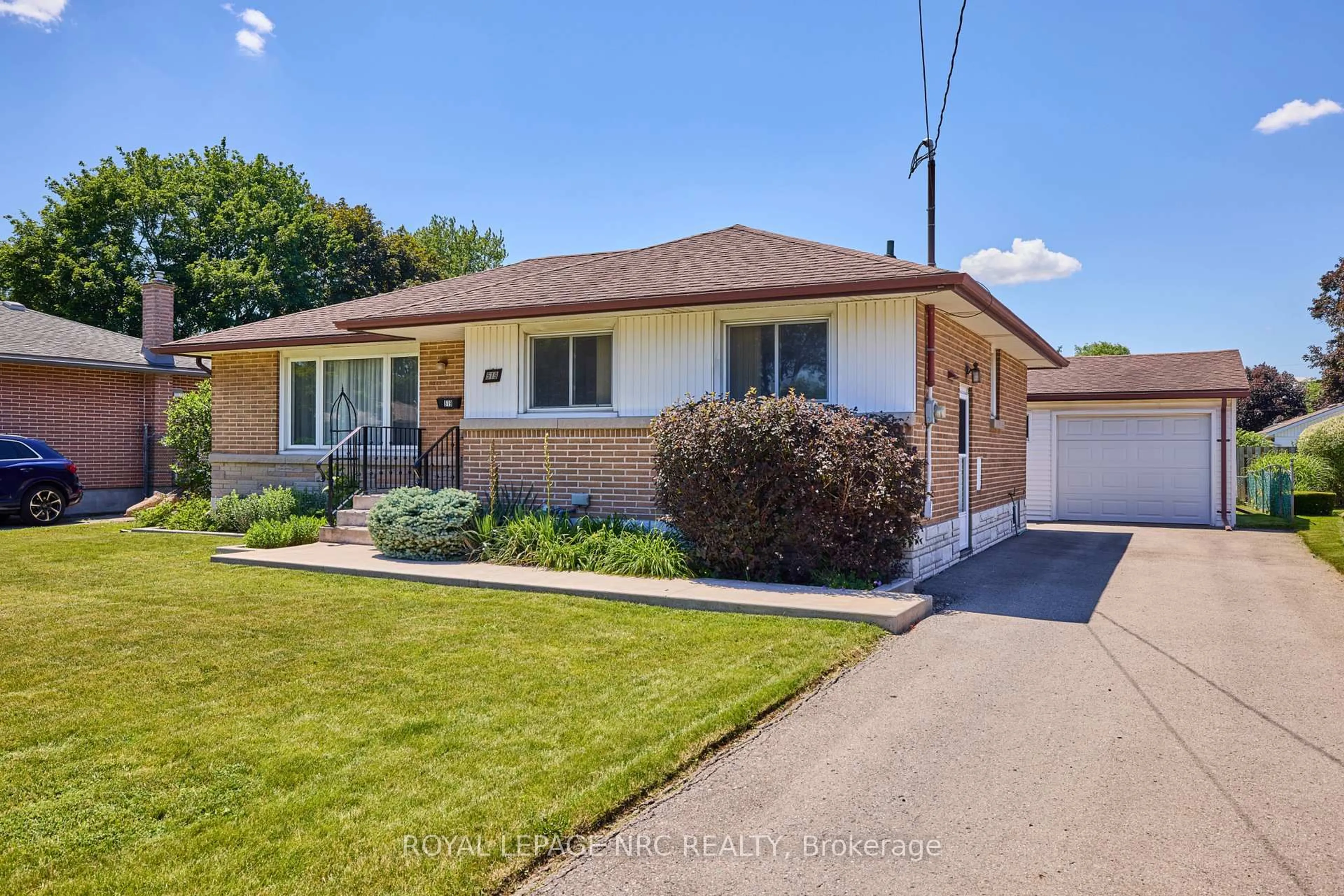 Home with brick exterior material, street for 519 Alan Ave, Welland Ontario L3C 2Y8