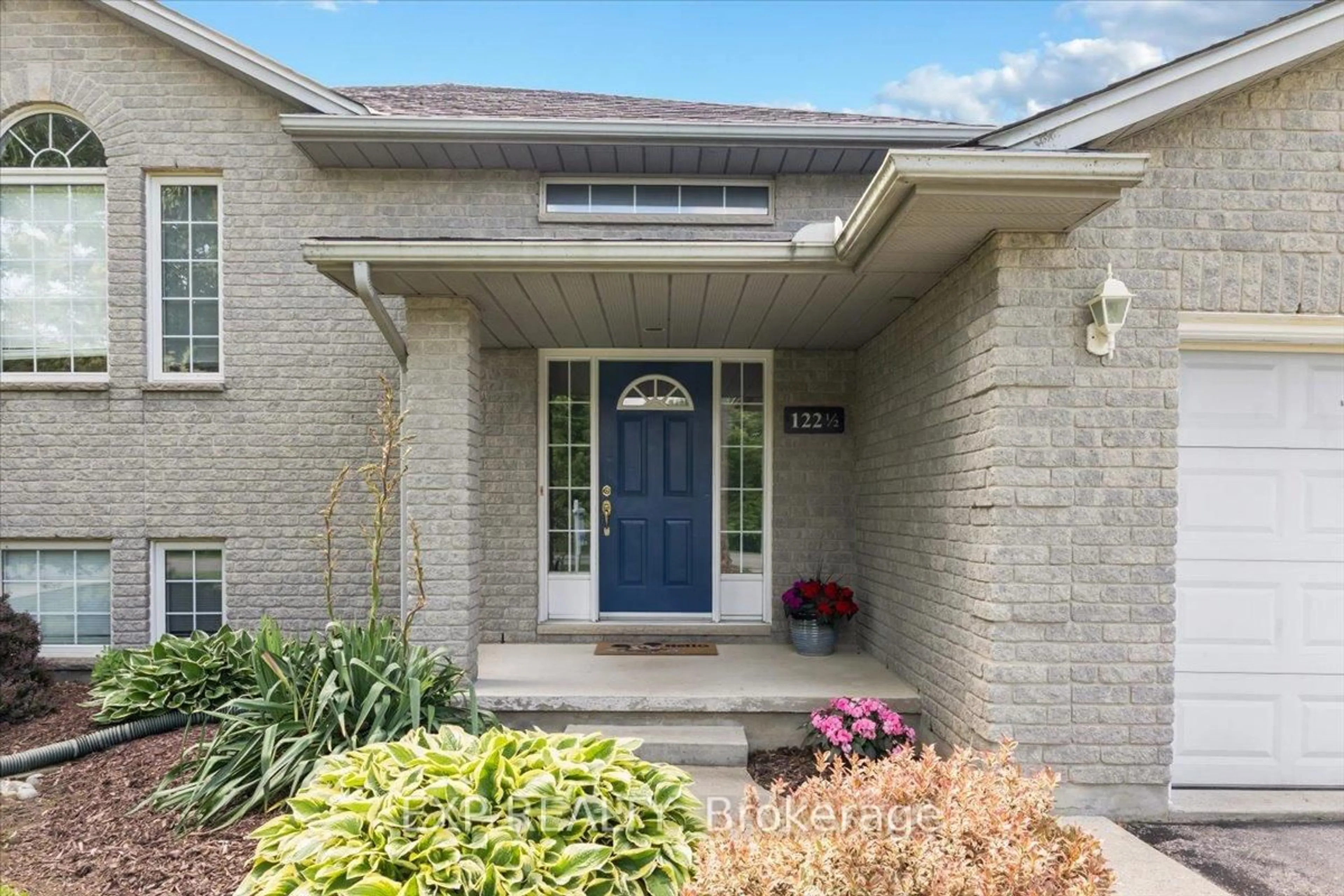 Home with brick exterior material, street for 122 1/2 Railway Ave, Middlesex Centre Ontario N0L 1P0