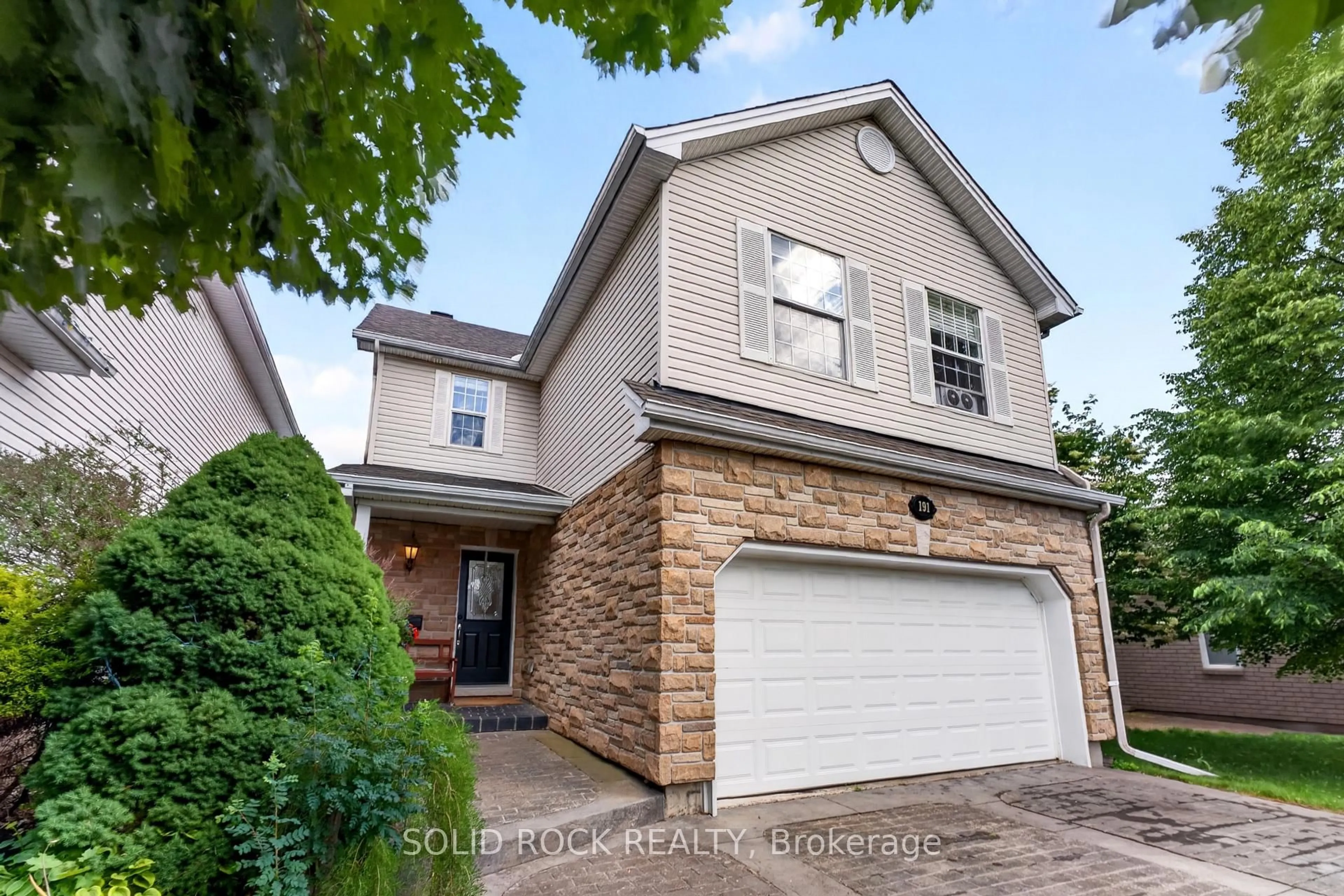 Home with brick exterior material, street for 191 Yoho Dr, Ottawa Ontario K2M 2N2