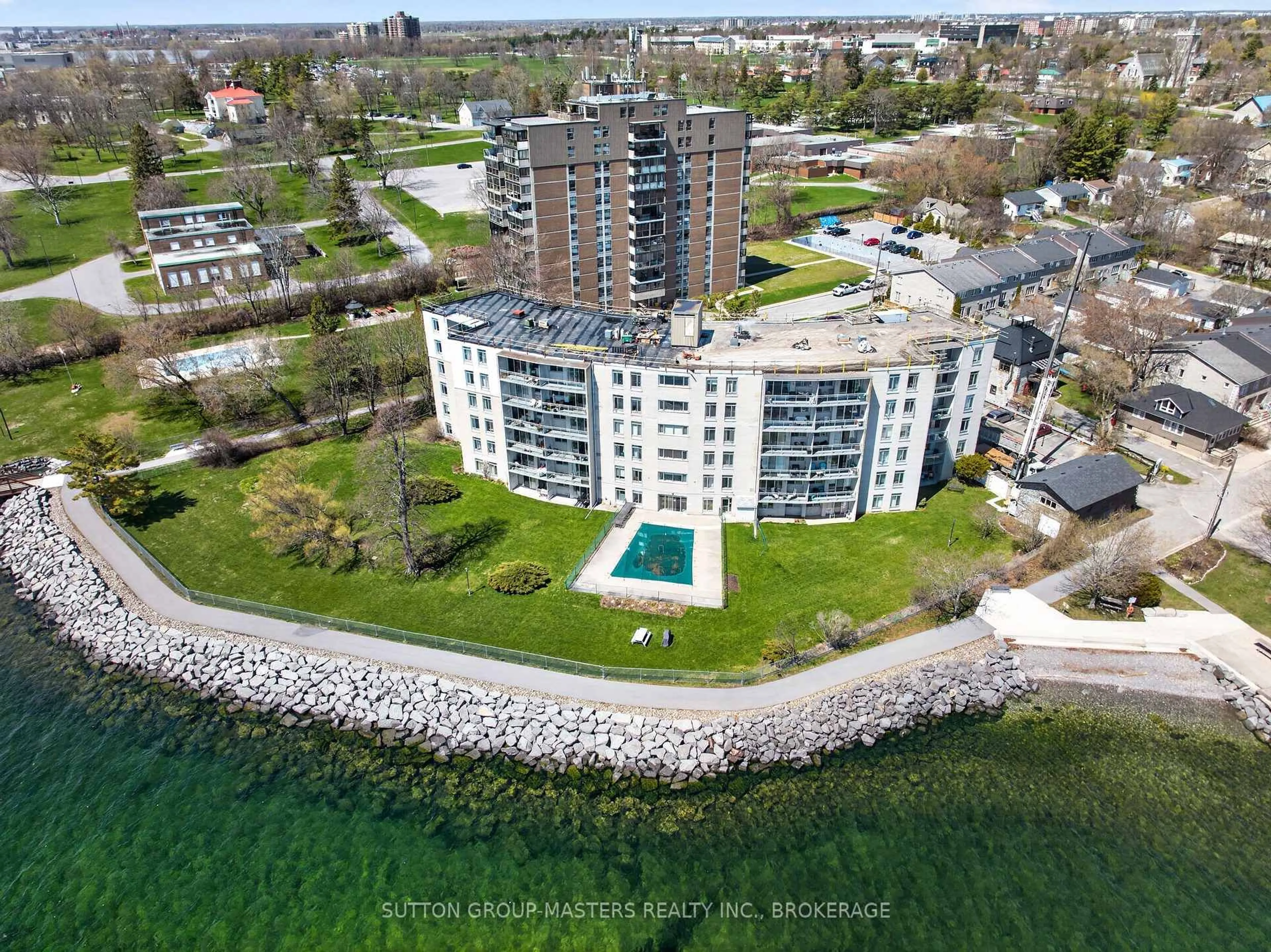 A pic from outside/outdoor area/front of a property/back of a property/a pic from drone, water/lake/river/ocean view for 1 Mowat Ave #401, Kingston Ontario K7M 1J8