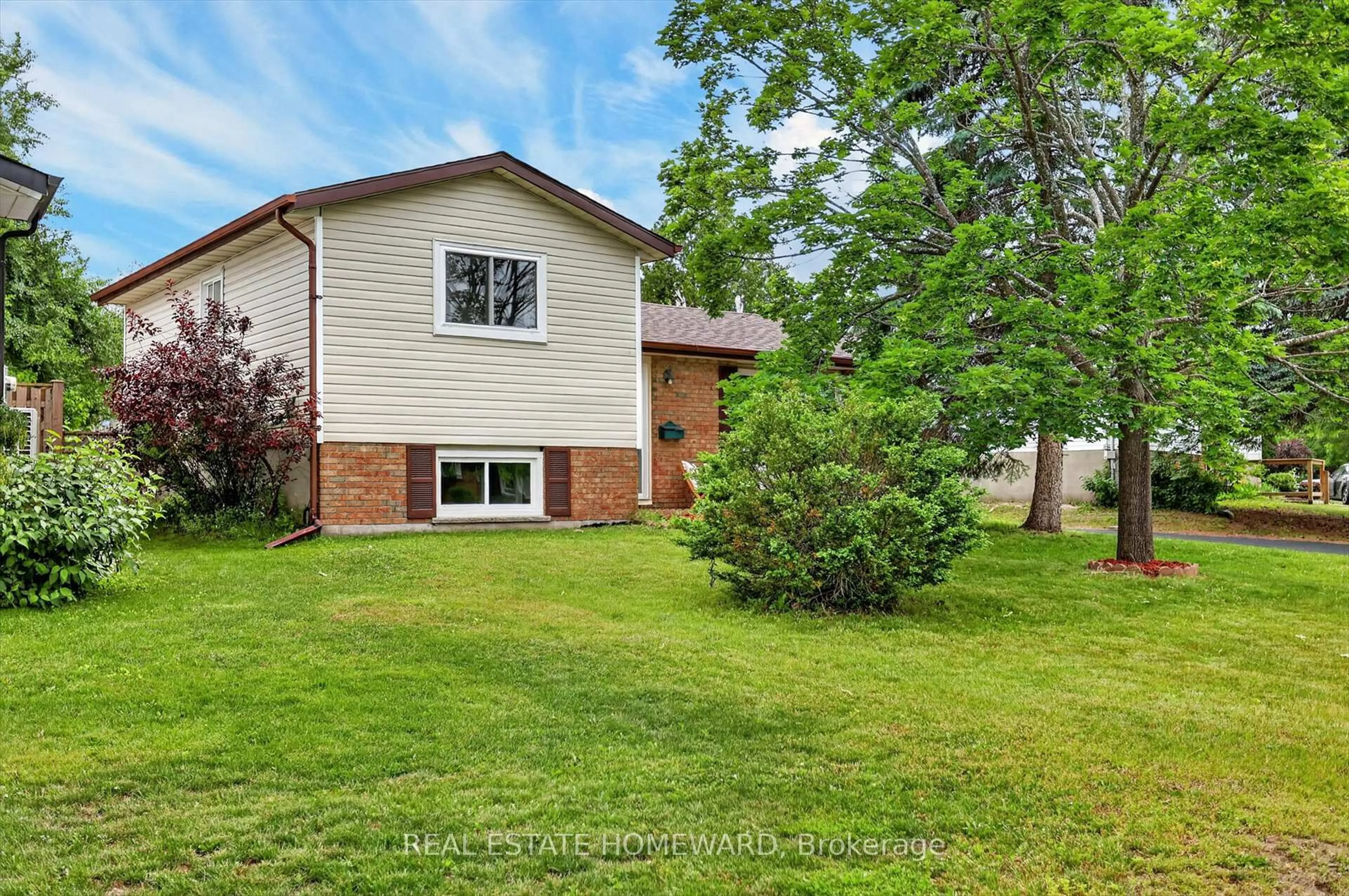 Home with vinyl exterior material, street for 1569 Redwood Dr, Peterborough Ontario K9K 1N9