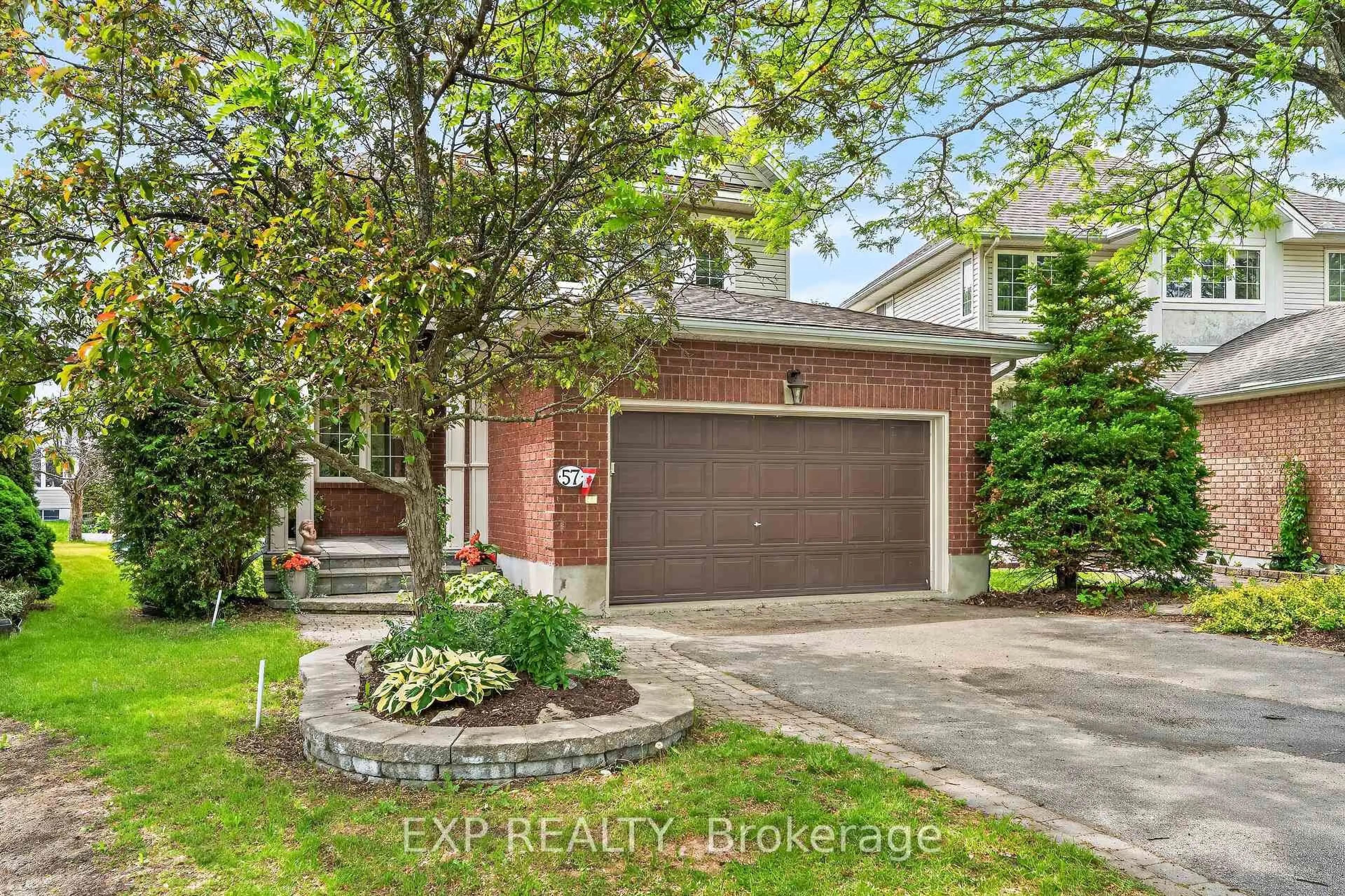 Home with brick exterior material, street for 57 Rivergreen Cres, Ottawa Ontario K2M 2W9
