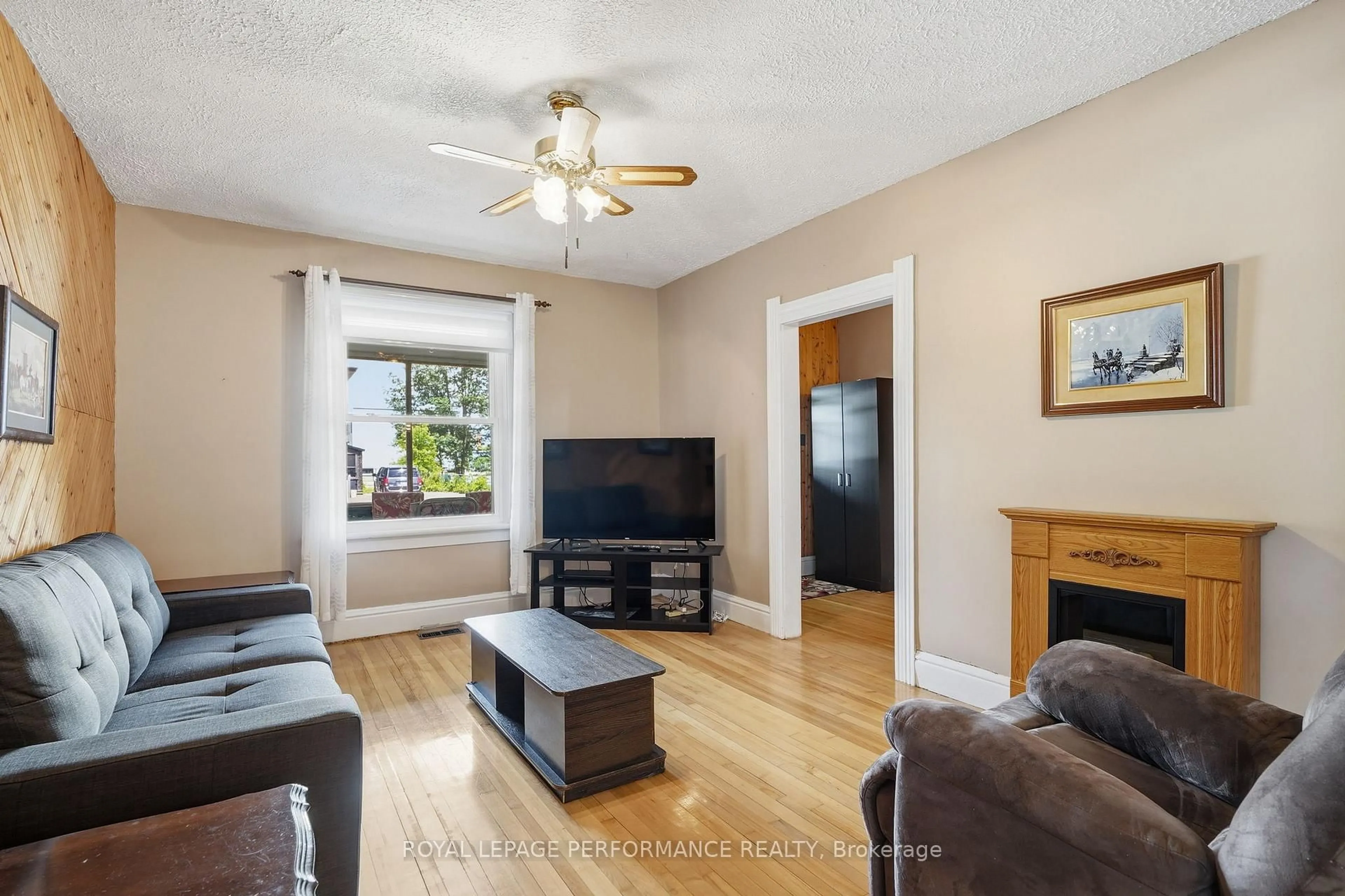 Living room with furniture, wood/laminate floor for 178 Nelson St, Hawkesbury Ontario K6A 1L8
