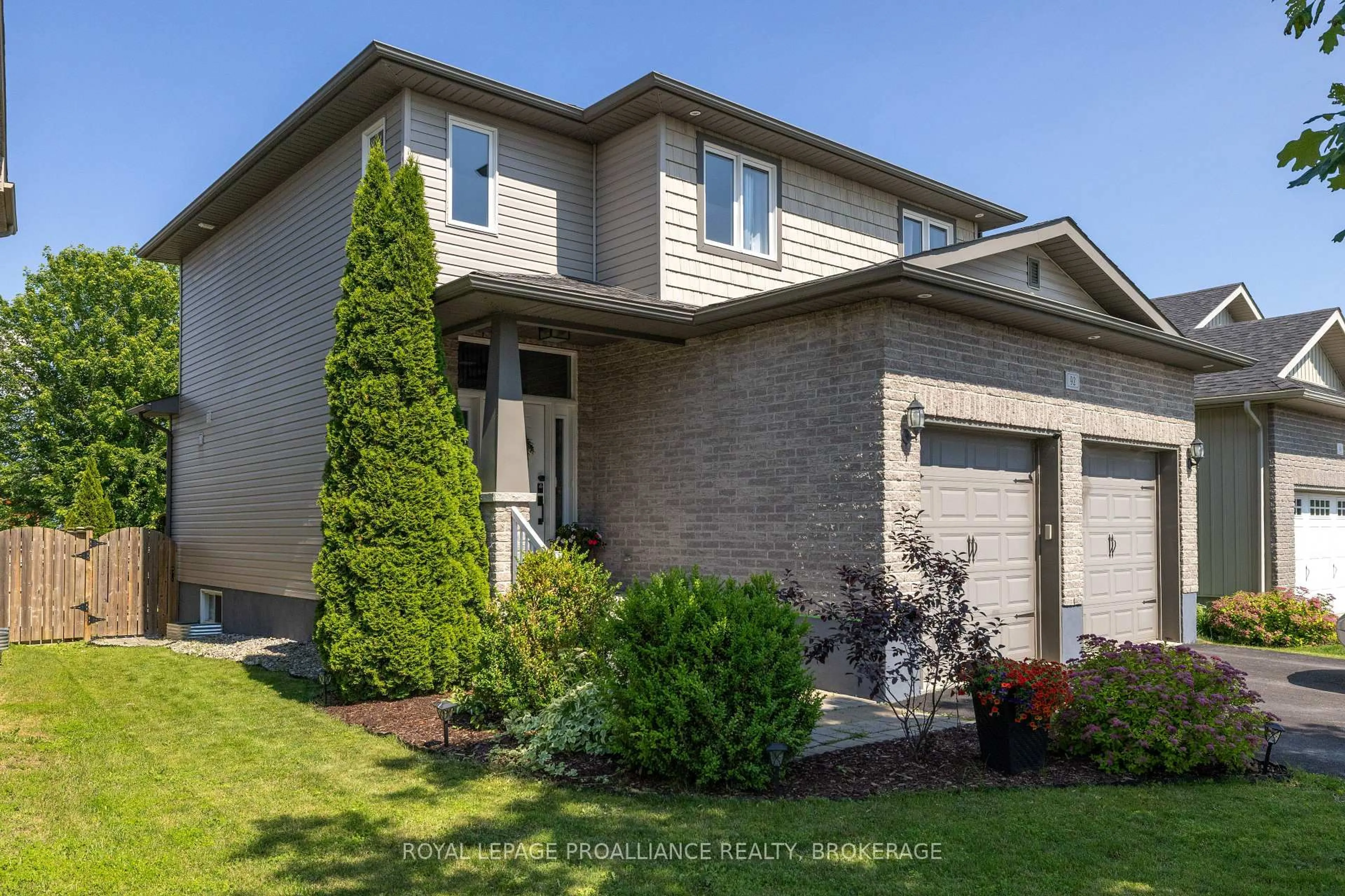 Home with brick exterior material, street for 92 Windermere Blvd, Bath Ontario K0H 1G0