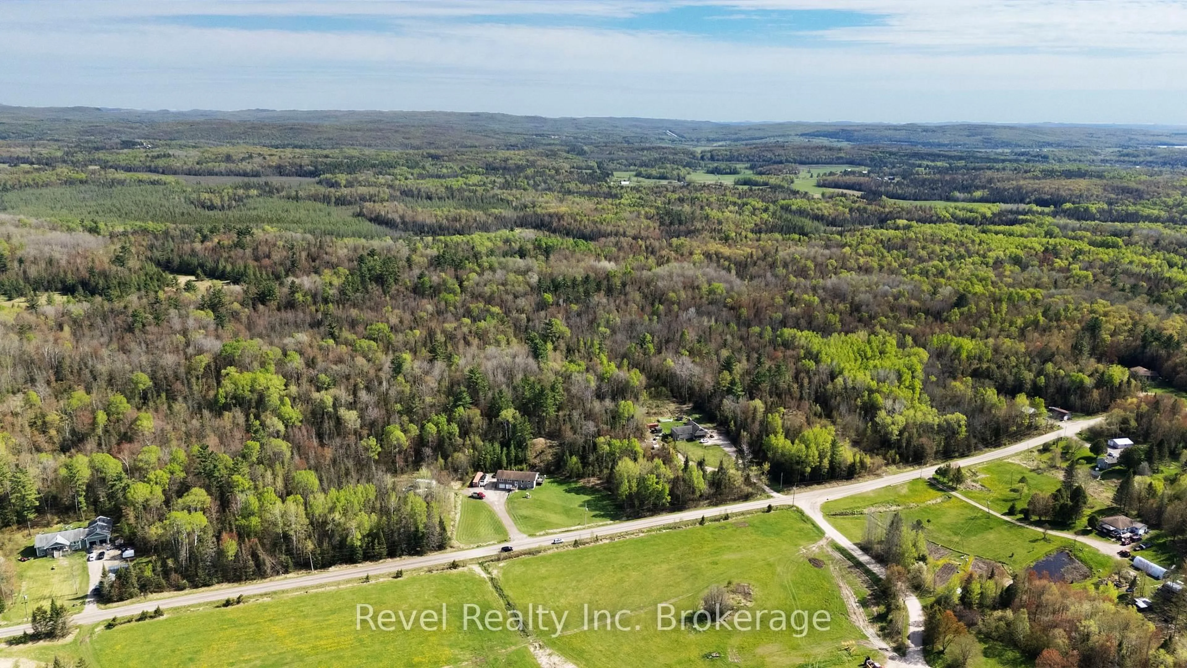 A pic from outside/outdoor area/front of a property/back of a property/a pic from drone, water/lake/river/ocean view for 471 Lindquist Line, Powassan Ontario P0H 1Z0