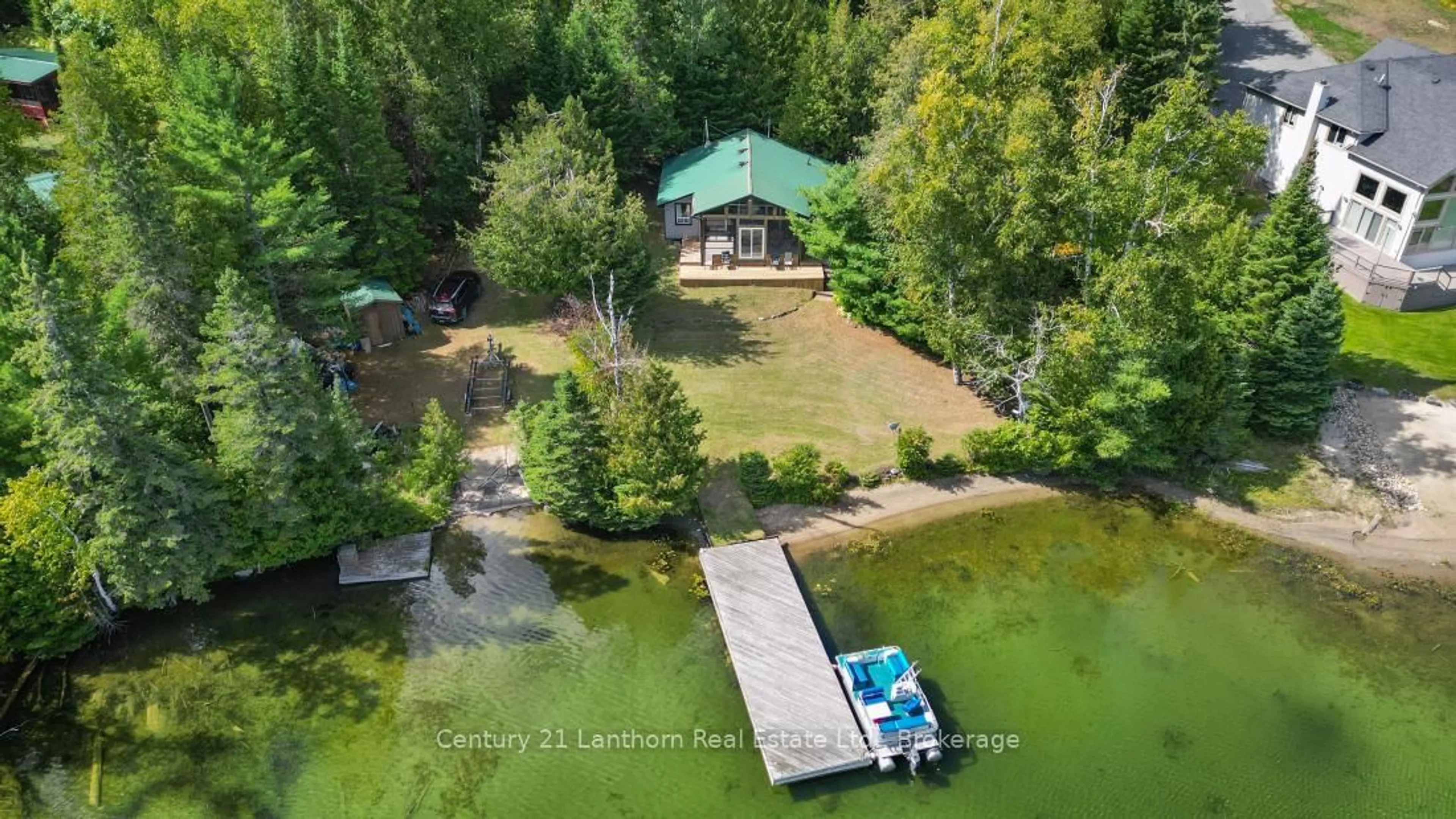 A pic from outside/outdoor area/front of a property/back of a property/a pic from drone, water/lake/river/ocean view for 498 Egan Creek Rd, Madoc Ontario K0K 1Y0