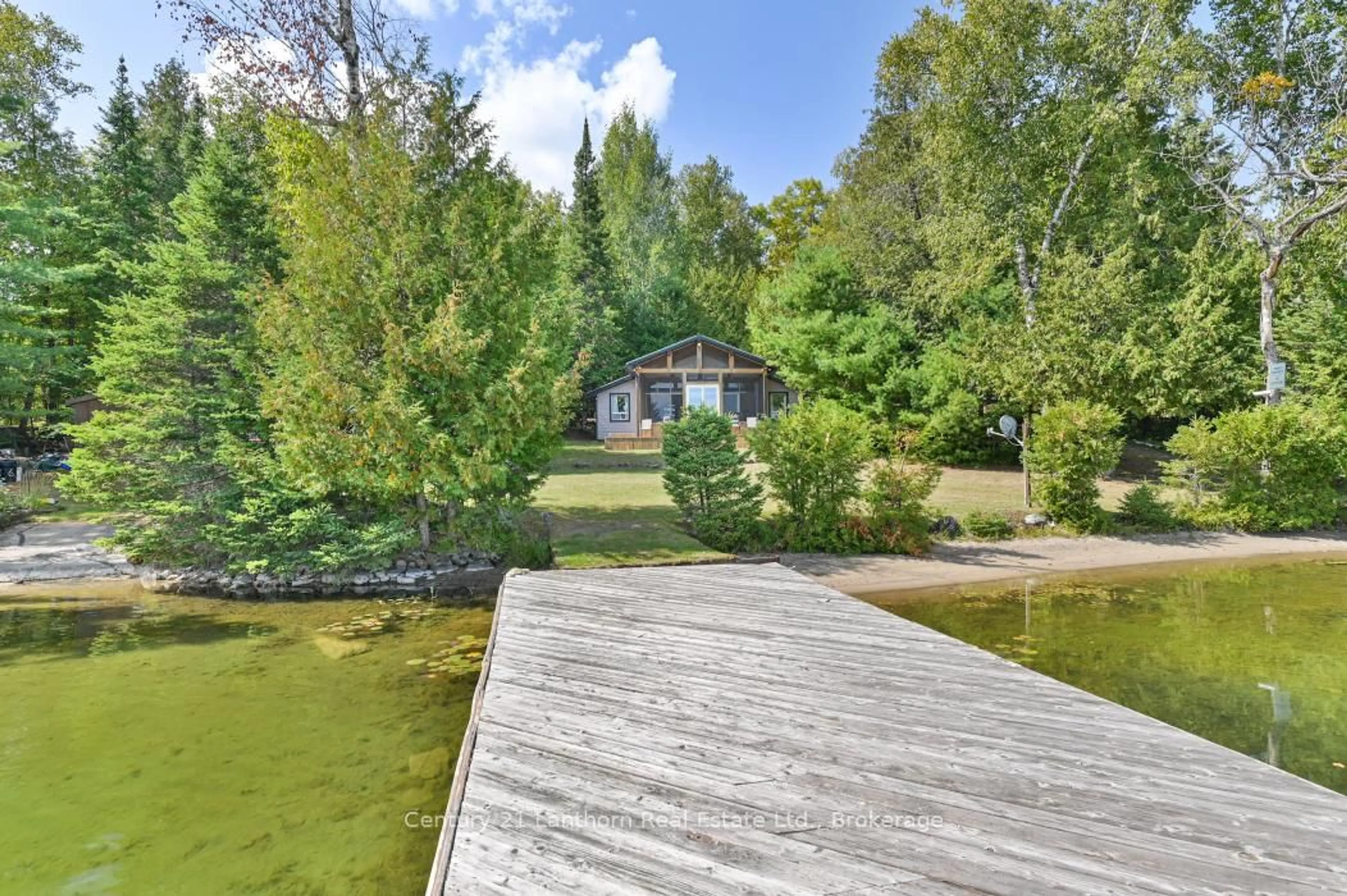 A pic from outside/outdoor area/front of a property/back of a property/a pic from drone, water/lake/river/ocean view for 498 Egan Creek Rd, Madoc Ontario K0K 1Y0
