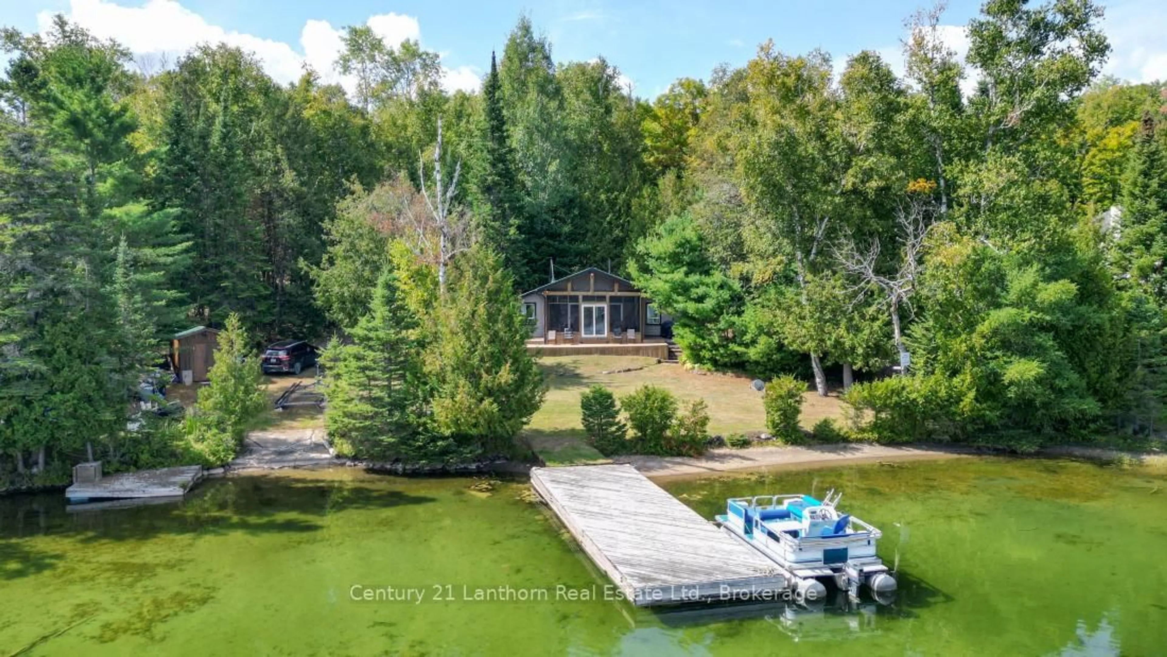 A pic from outside/outdoor area/front of a property/back of a property/a pic from drone, water/lake/river/ocean view for 498 Egan Creek Rd, Madoc Ontario K0K 1Y0