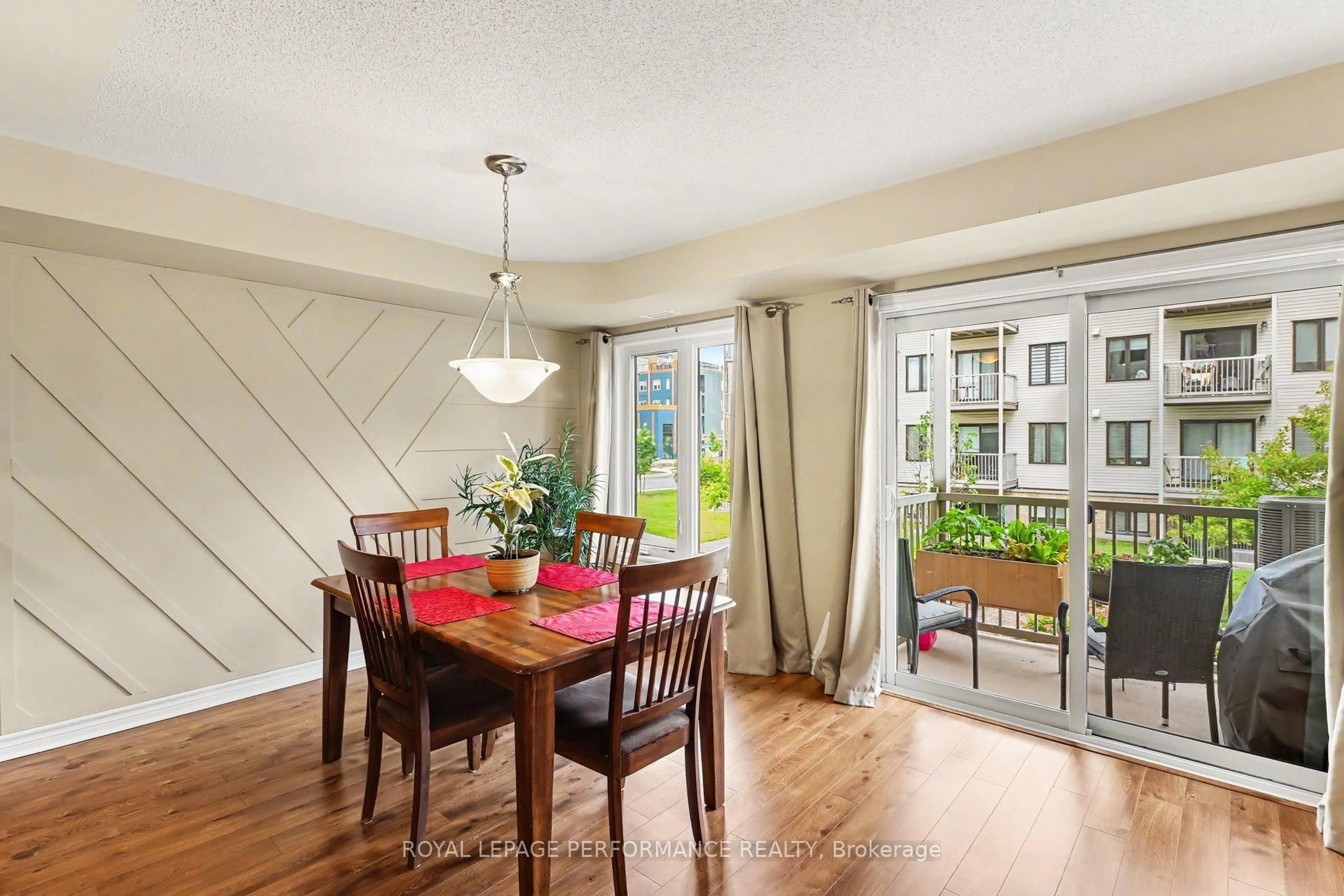 Dining room, wood/laminate floor for 115 Bluestone Private #3, Ottawa Ontario K4A 0X7