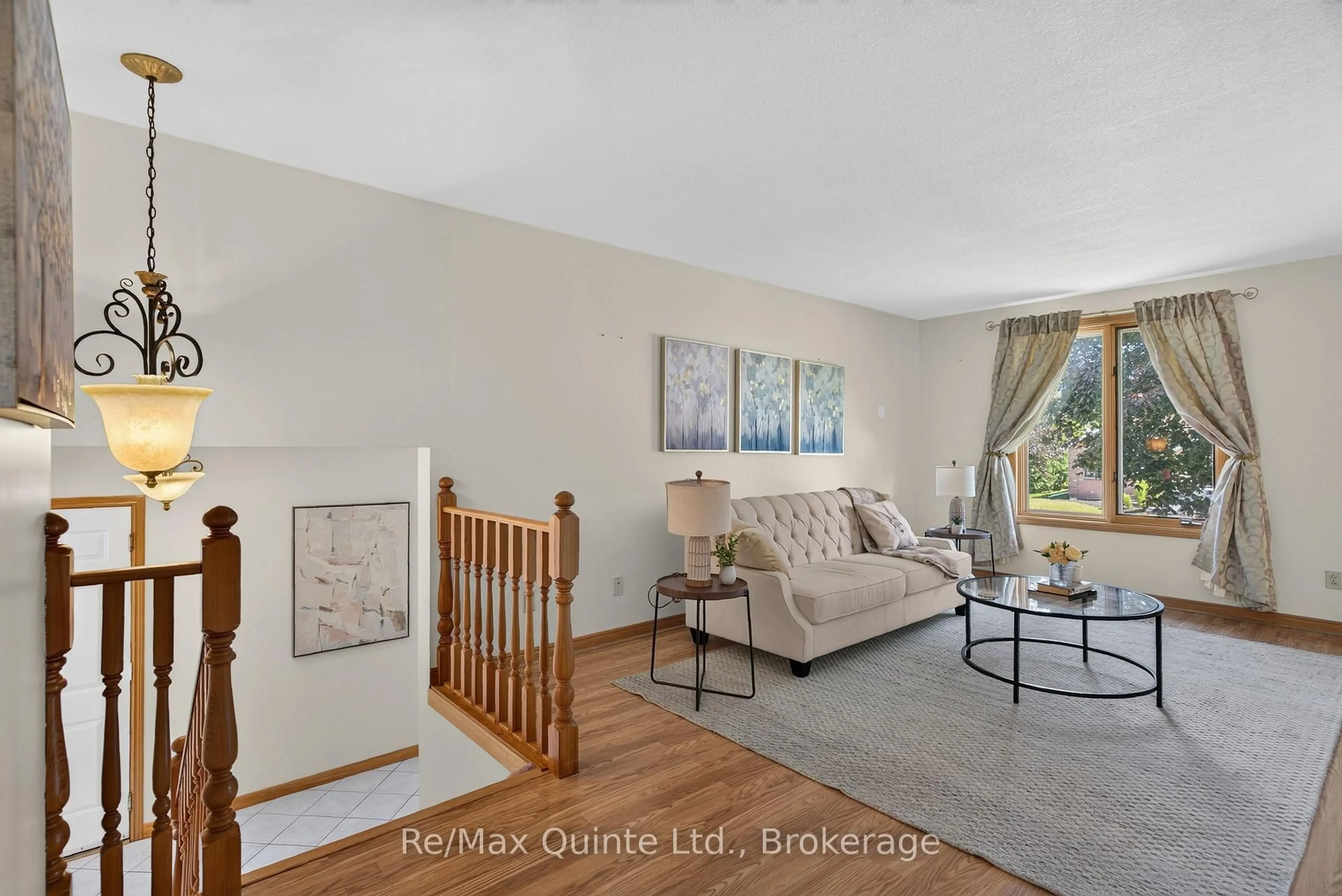 Living room with furniture, ceramic/tile floor for 83 Parkview Hts, Quinte West Ontario K8V 5T9