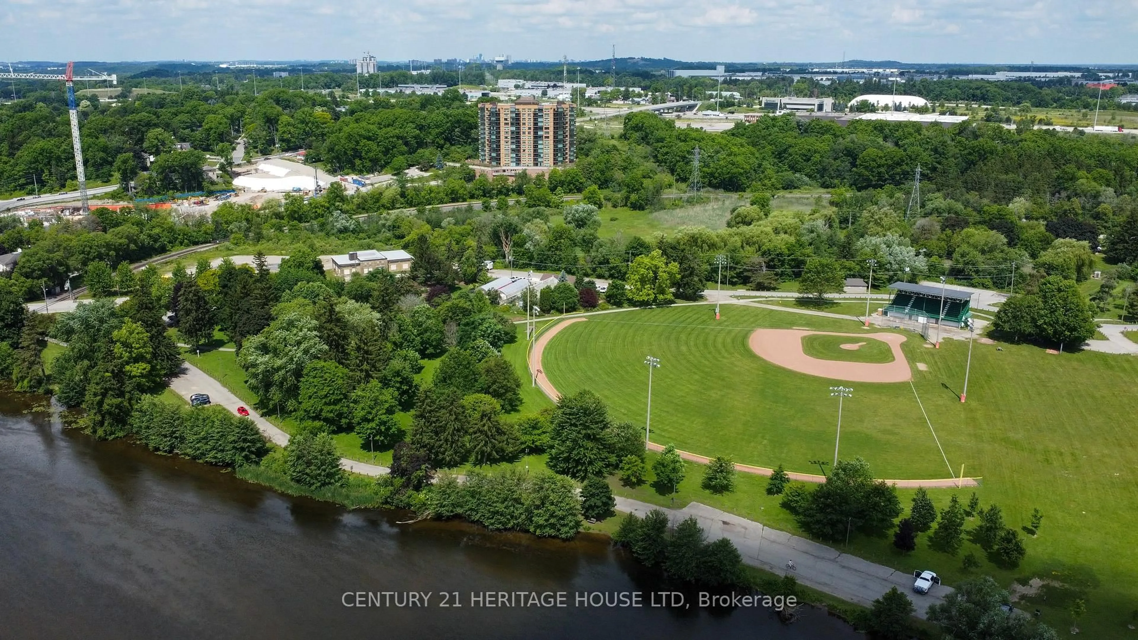 A pic from outside/outdoor area/front of a property/back of a property/a pic from drone, water/lake/river/ocean view for 237 King St #305, Cambridge Ontario N3H 5L2