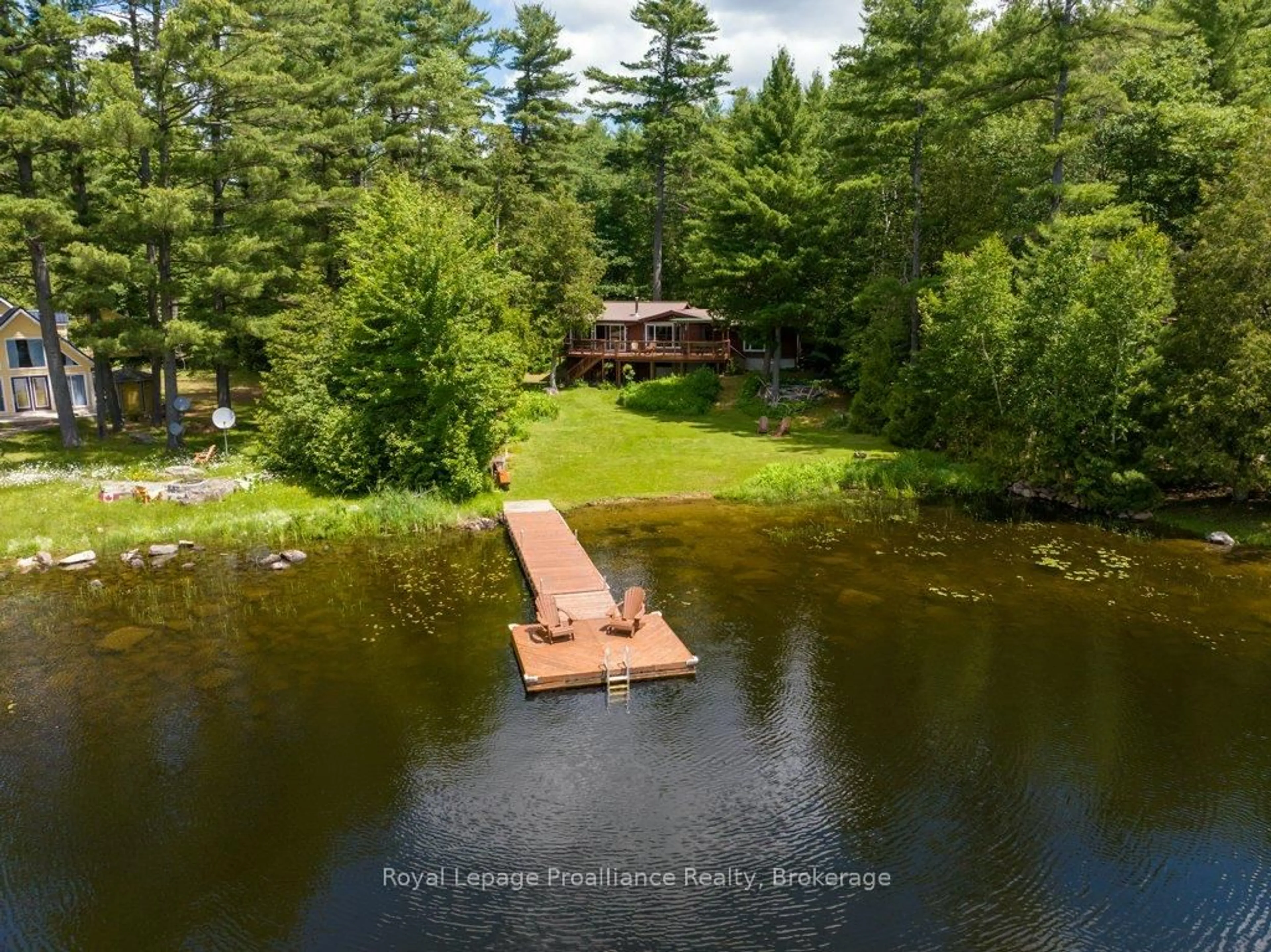 A pic from outside/outdoor area/front of a property/back of a property/a pic from drone, water/lake/river/ocean view for 1793A Hughes Landing Rd, Cloyne Ontario K0H 1K0