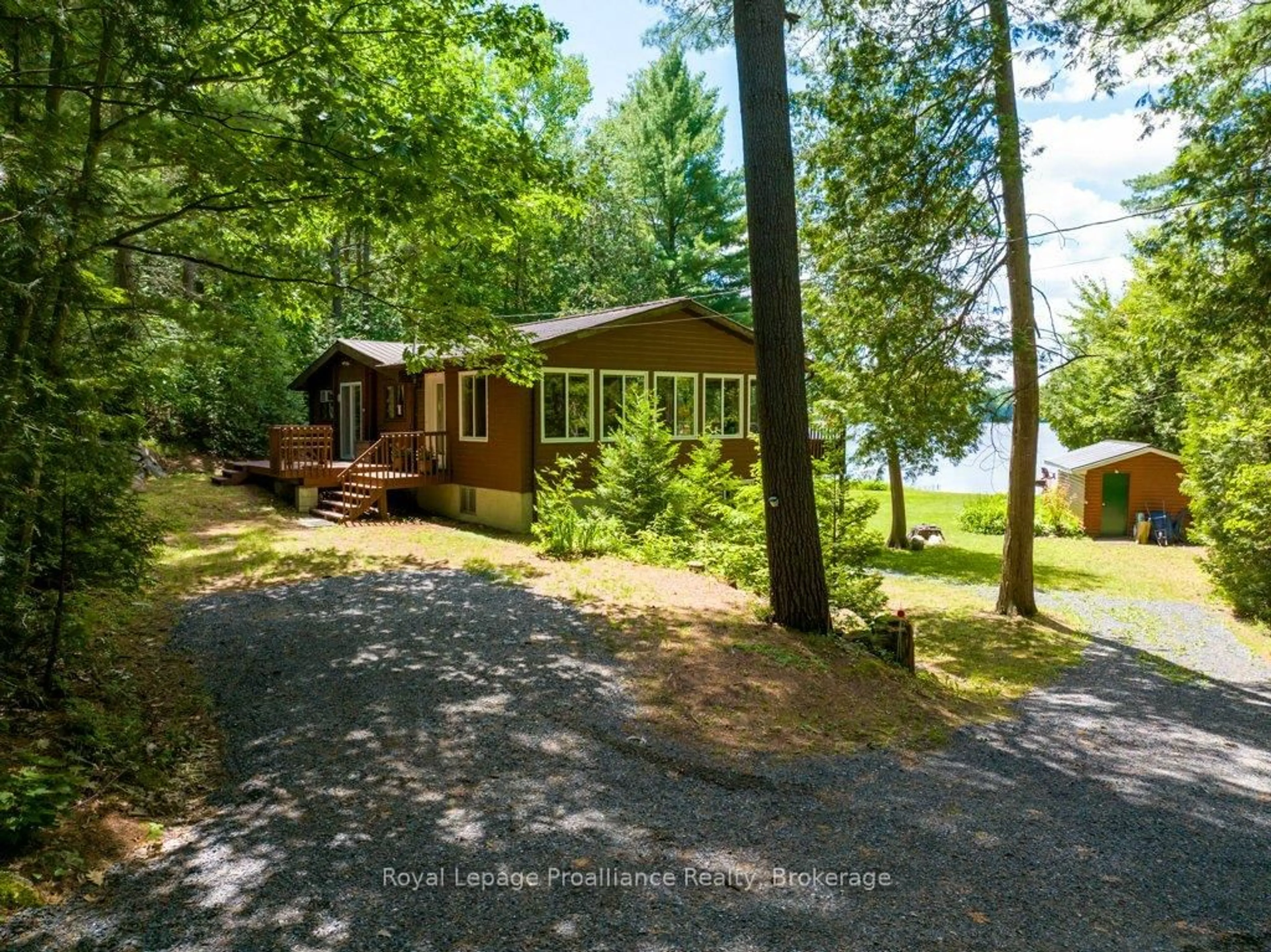 A pic from outside/outdoor area/front of a property/back of a property/a pic from drone, water/lake/river/ocean view for 1793A Hughes Landing Rd, Cloyne Ontario K0H 1K0