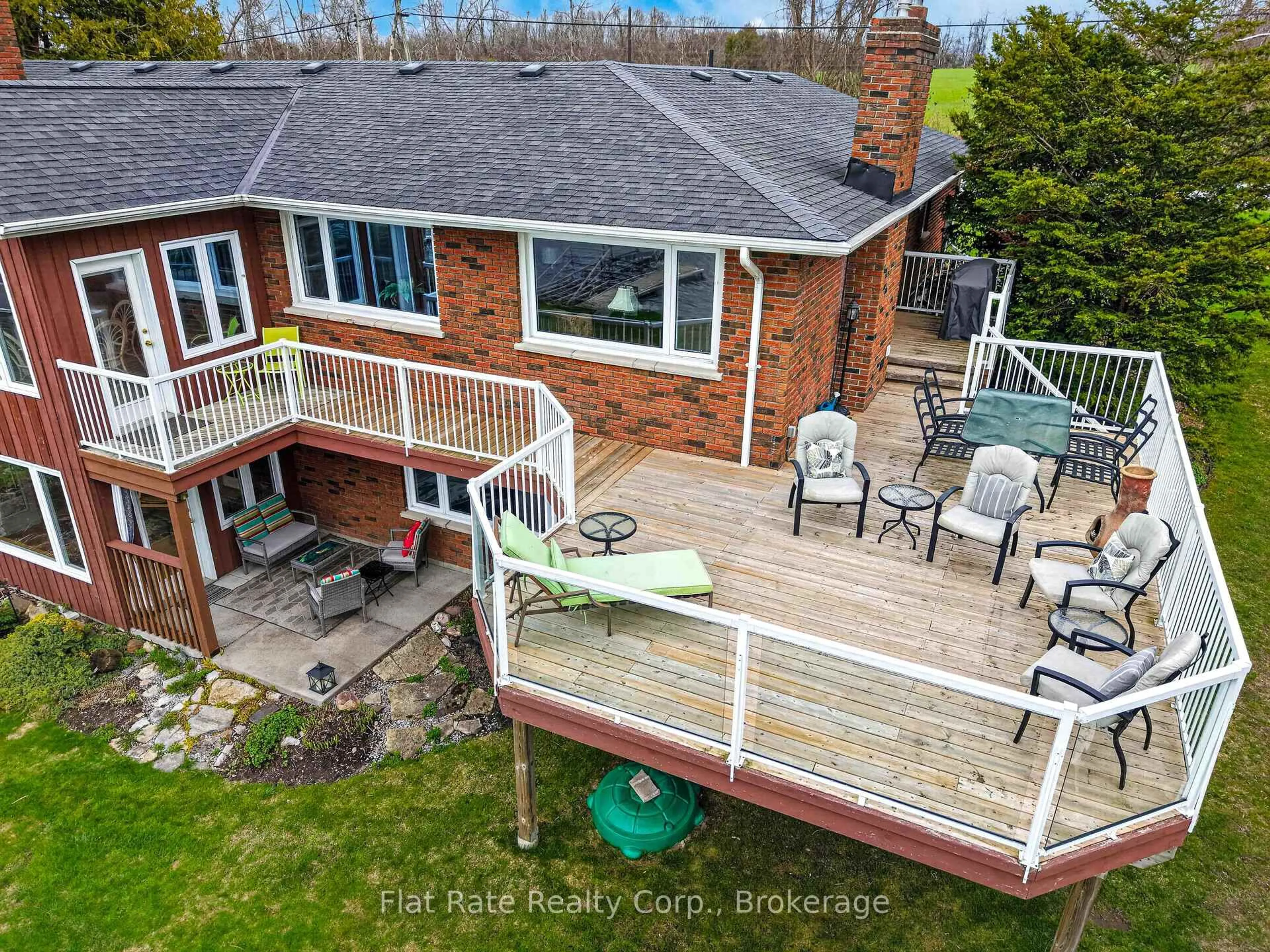 A pic from outside/outdoor area/front of a property/back of a property/a pic from drone, water/lake/river/ocean view for 1927 Pinehurst Ave, Selwyn Ontario K0L 2H0
