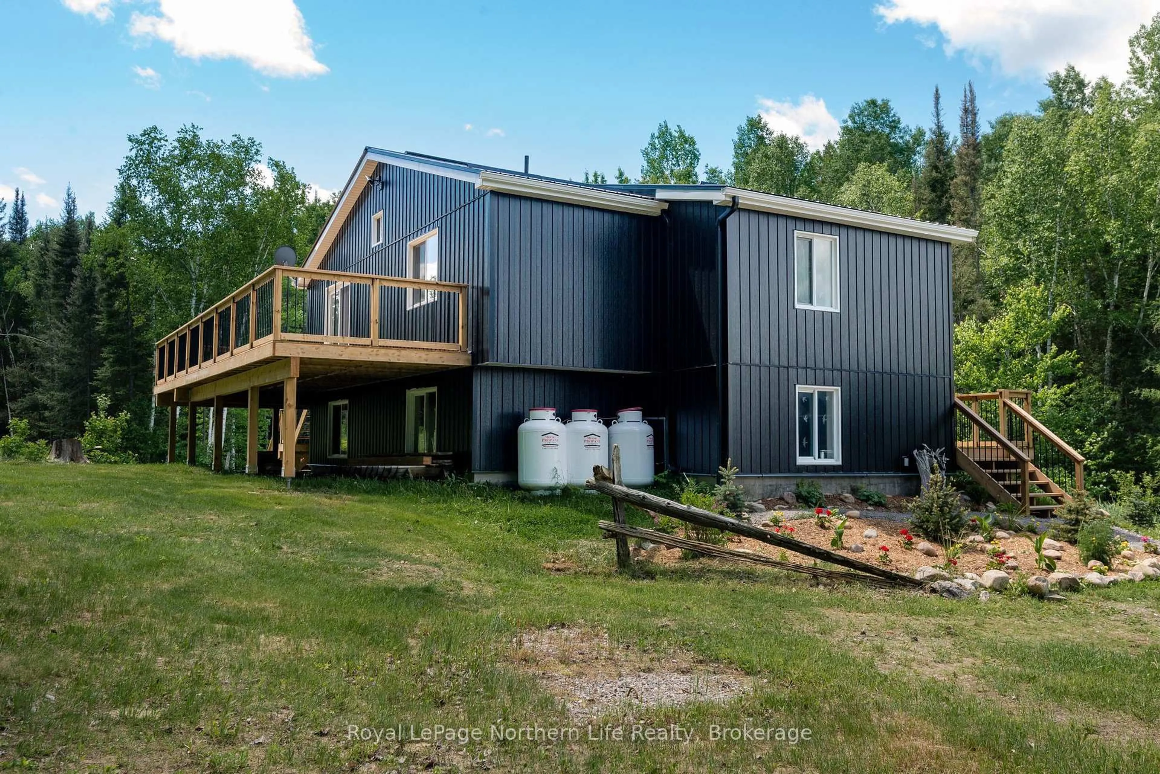 Home with vinyl exterior material, building for 70 Highway 17 E, Bonfield Ontario P0H 1E0