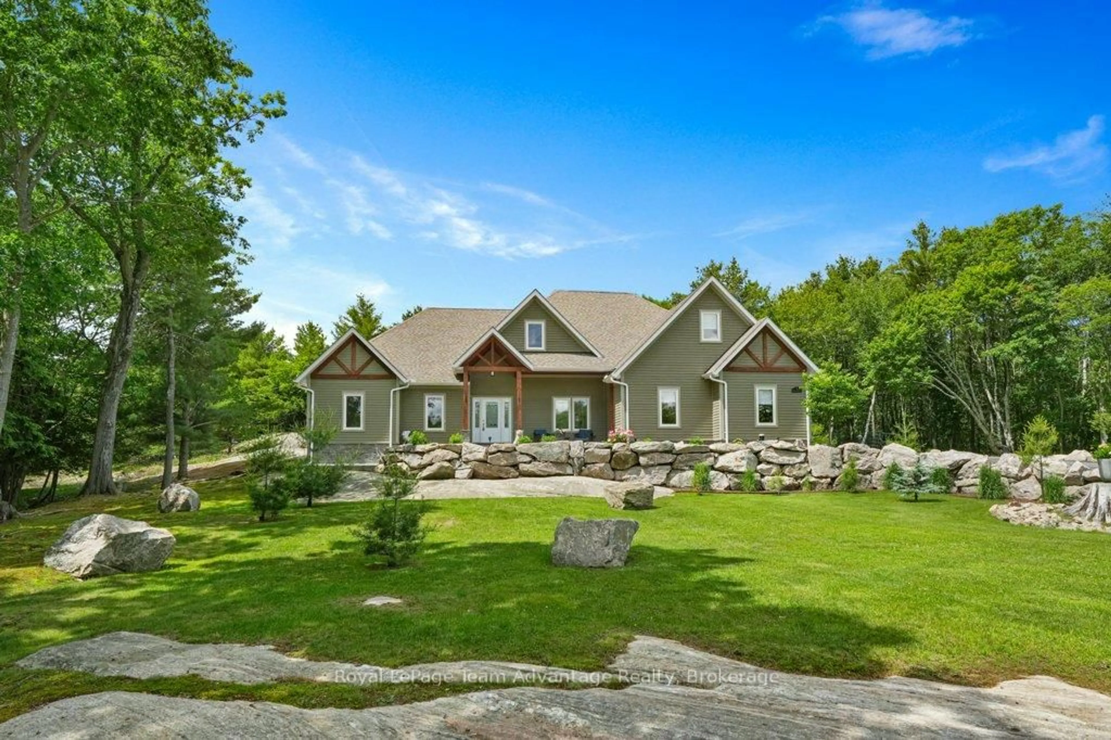 A pic from outside/outdoor area/front of a property/back of a property/a pic from drone, mountain view for 9 George Hunt Memorial Dr, McDougall Ontario P2A 2W9