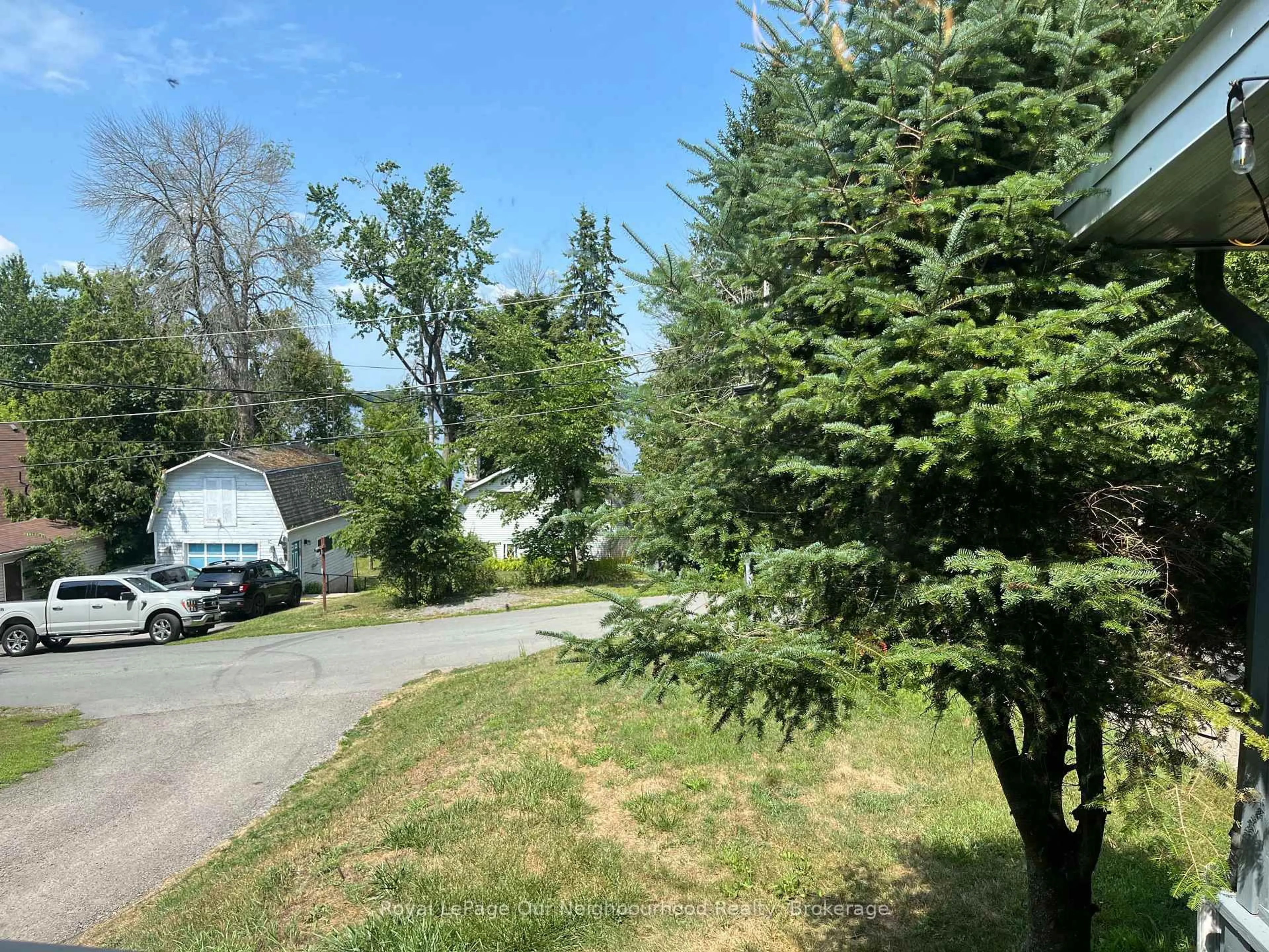 A pic from outside/outdoor area/front of a property/back of a property/a pic from drone, forest/trees view for 72 Lakeshore Rd, Limoges Ontario K0K 2M0