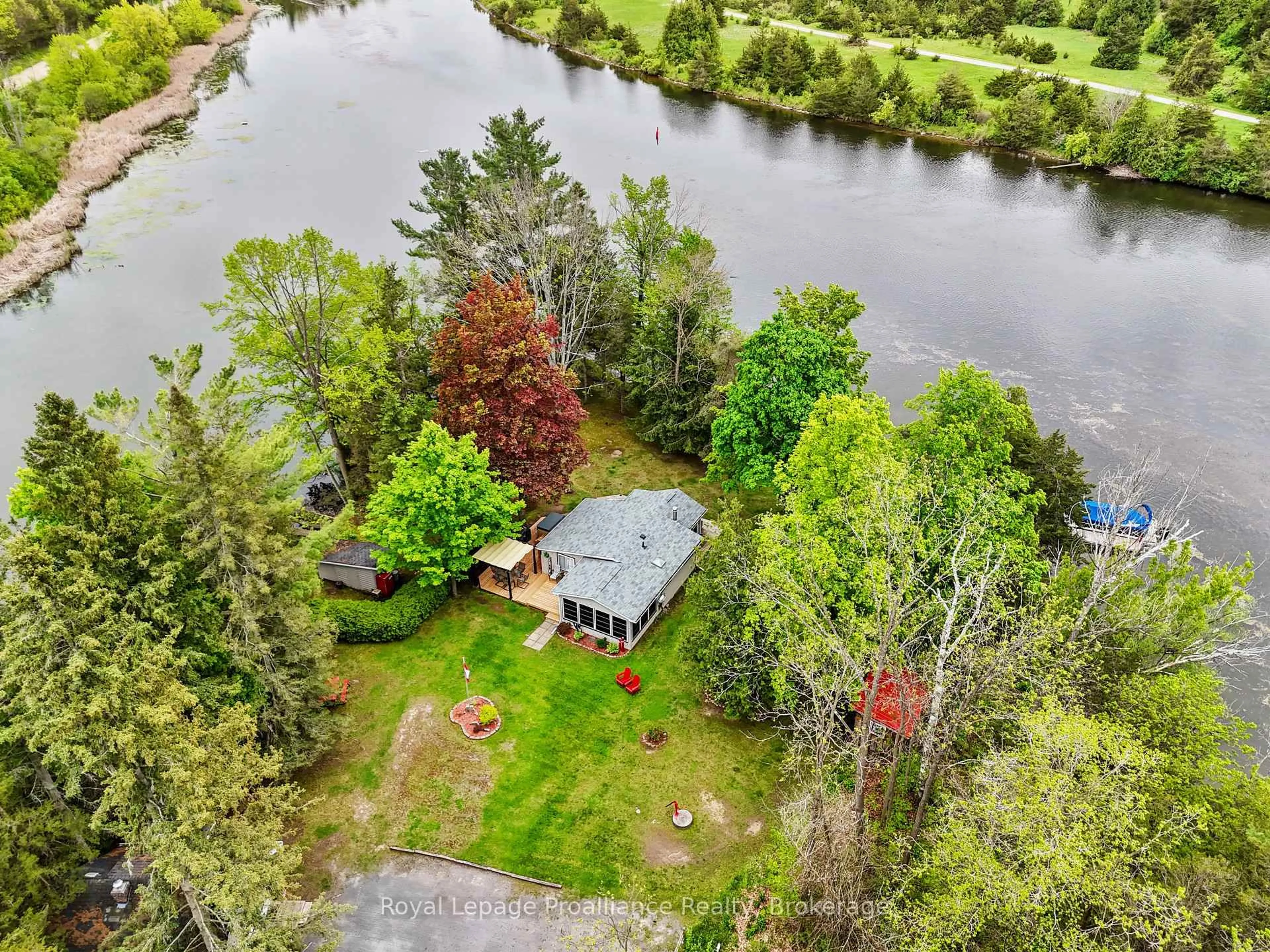 A pic from outside/outdoor area/front of a property/back of a property/a pic from drone, water/lake/river/ocean view for 249 4th Line #A, Trent Hills Ontario K0L 1L0